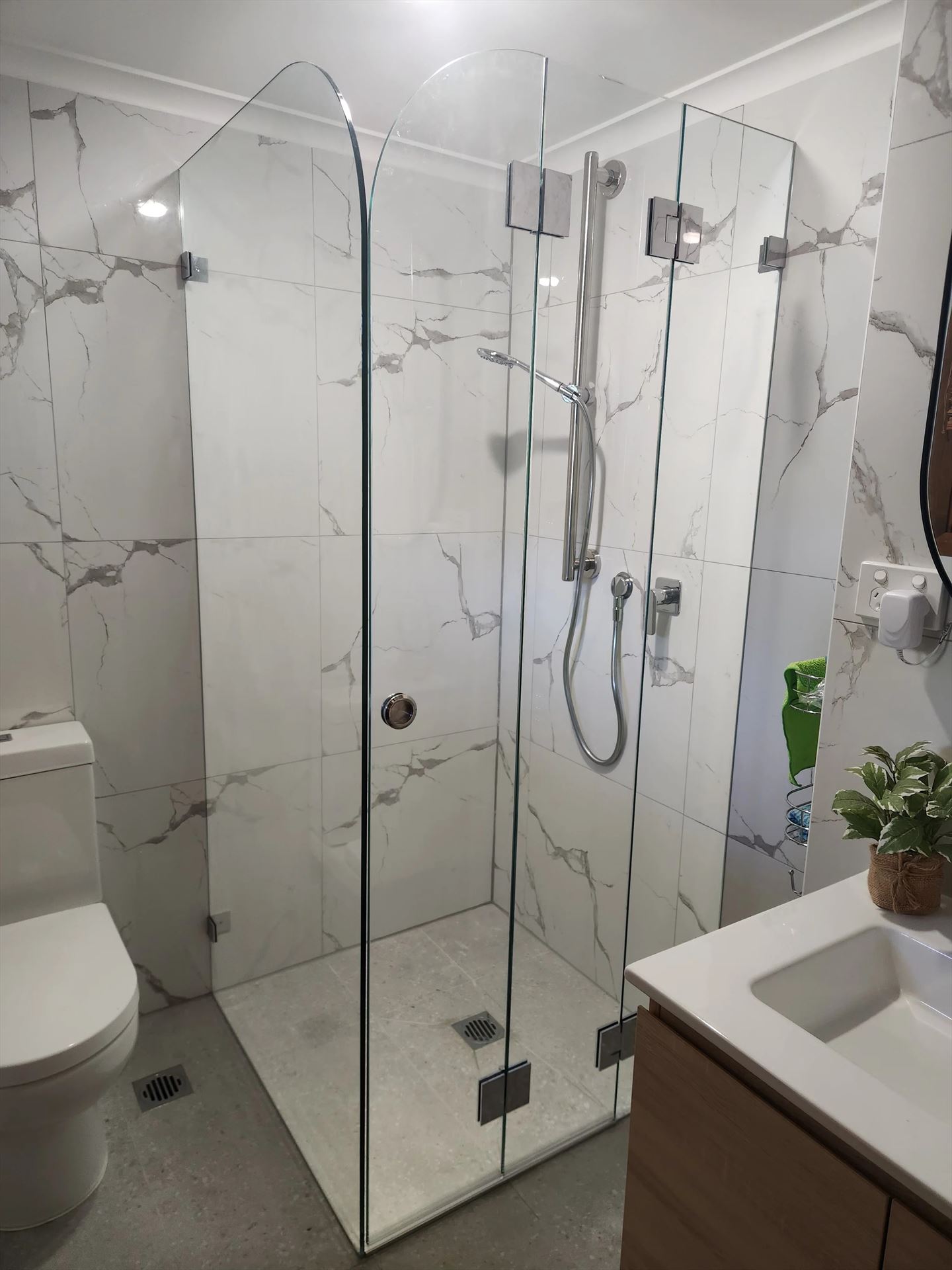 frameless shower screen with chrome hardware installed in Cherrybrook by Showerland