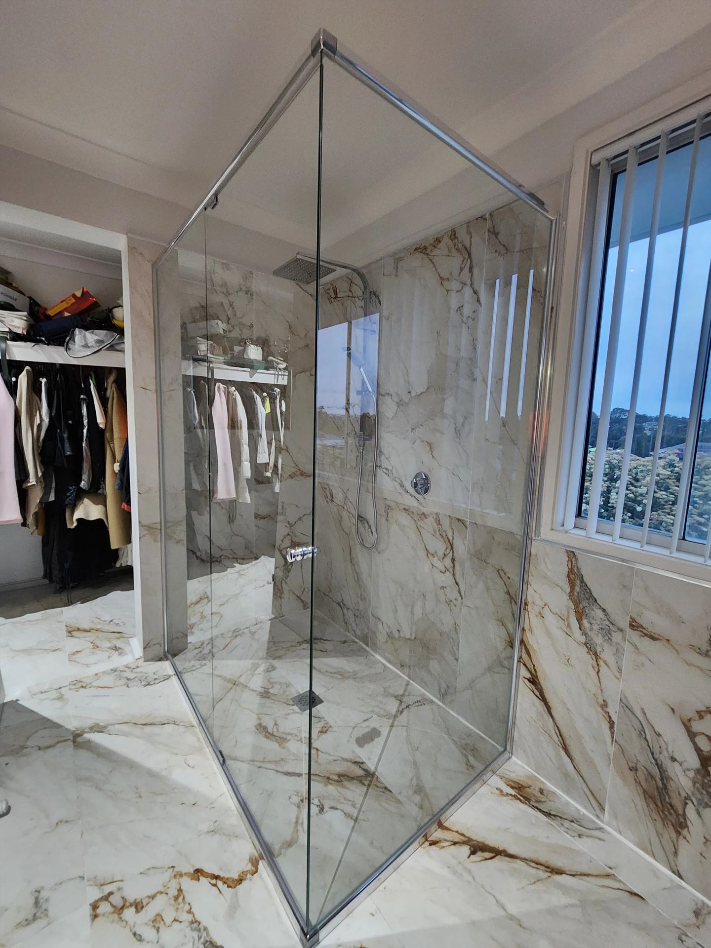 semi shower screen with chrome hardware installed in Kellyville by Showerland