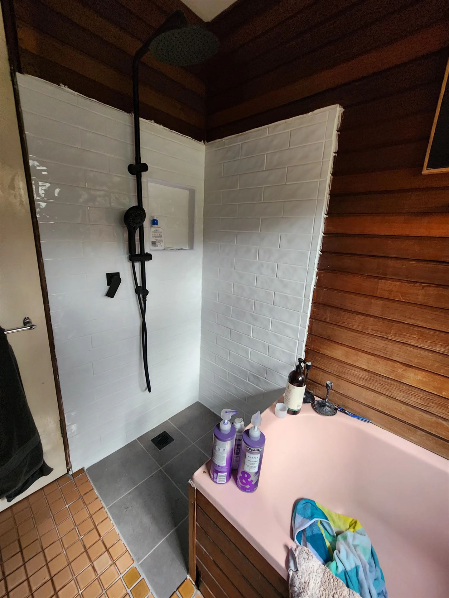 Bathroom before frameless shower screen install in Woronora