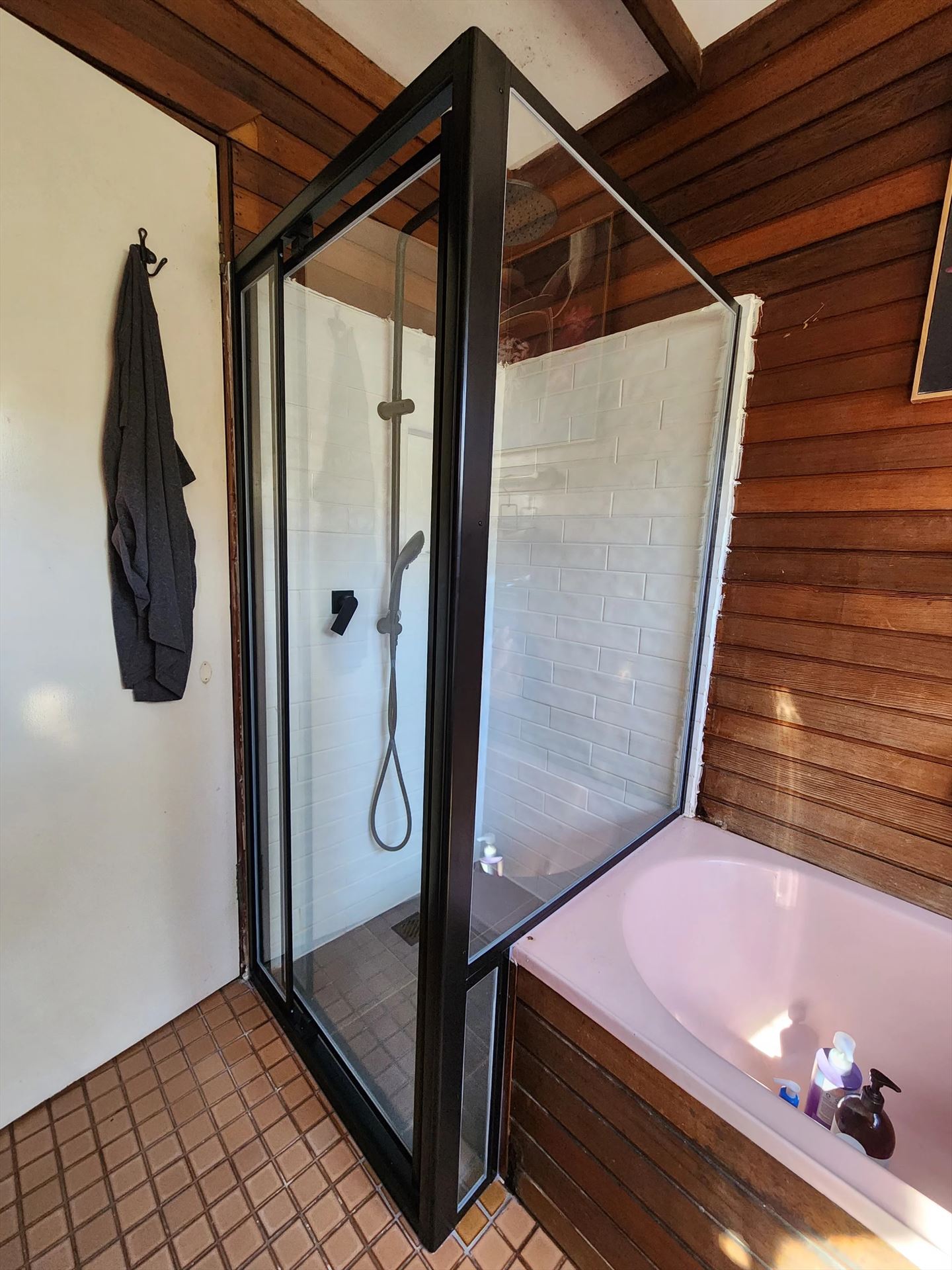 fully shower screen with black hardware installed in Woronora by Showerland