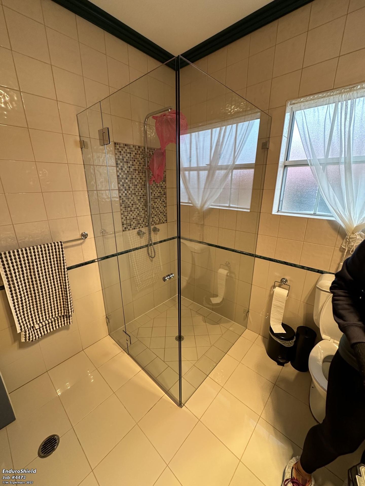 frameless shower screen with chrome hardware installed in Bonnyrigg Heights by Showerland