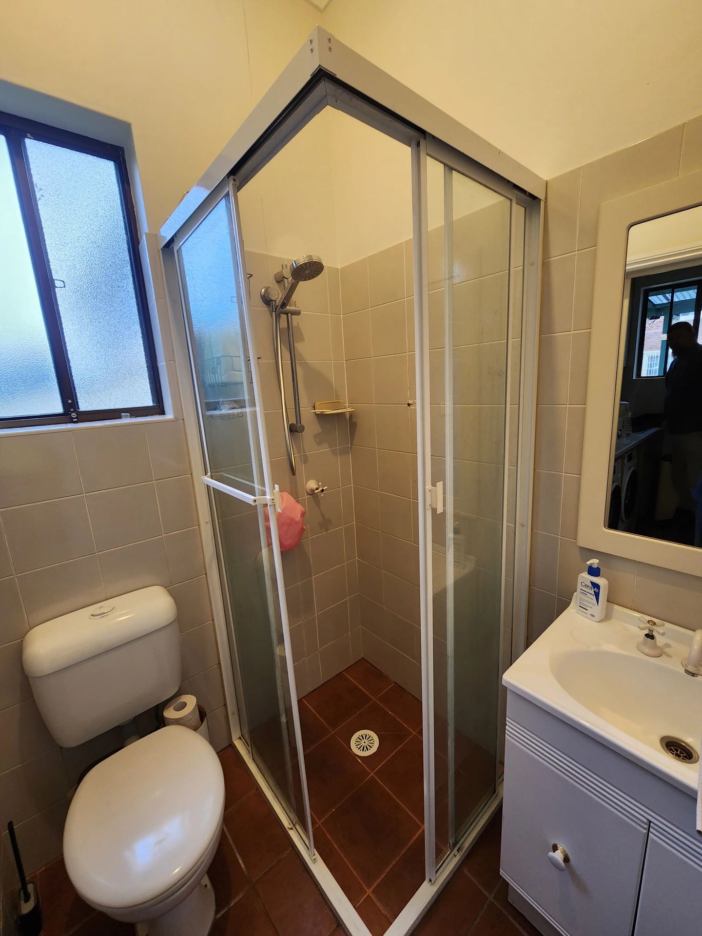 fully shower screen with white hardware installed in Ashfield by Showerland
