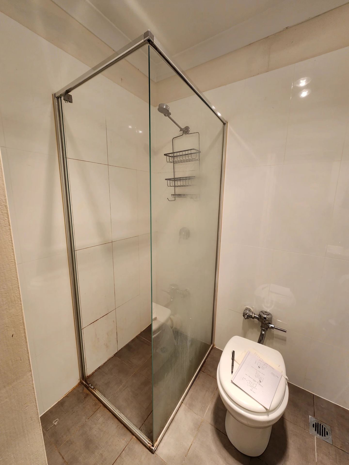 semi shower screen with chrome hardware installed in Elizabeth Bay by Showerland
