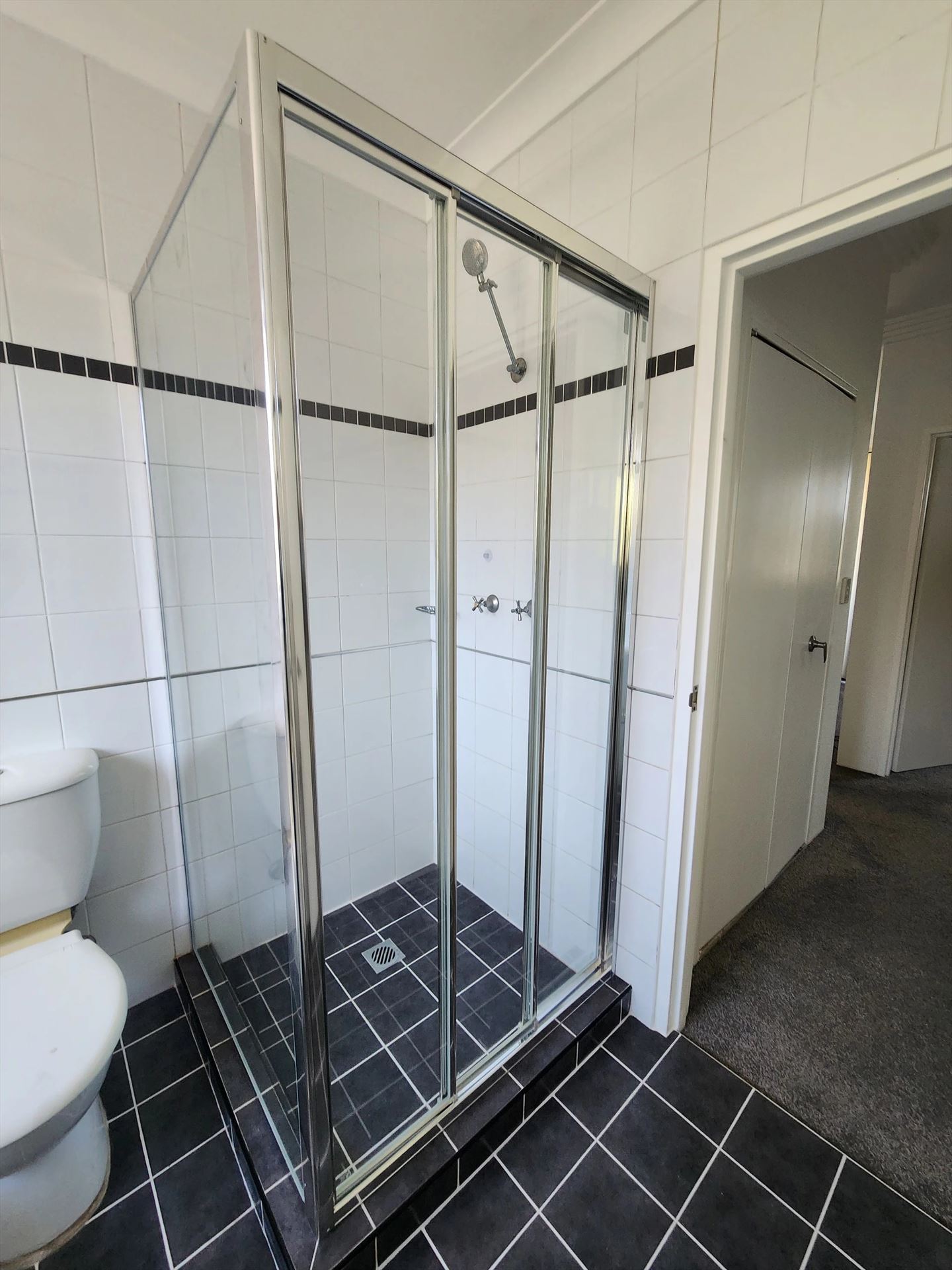 fully shower screen with chrome hardware installed in North Parramatta by Showerland