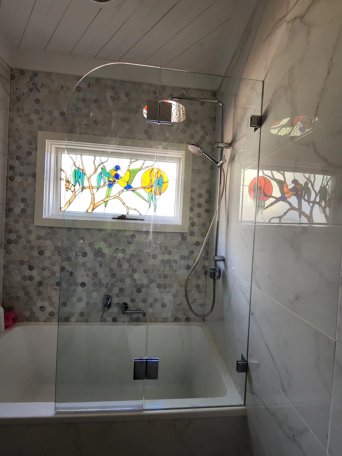 frameless shower screen with chrome hardware installed in Frenchs Forest by Showerland