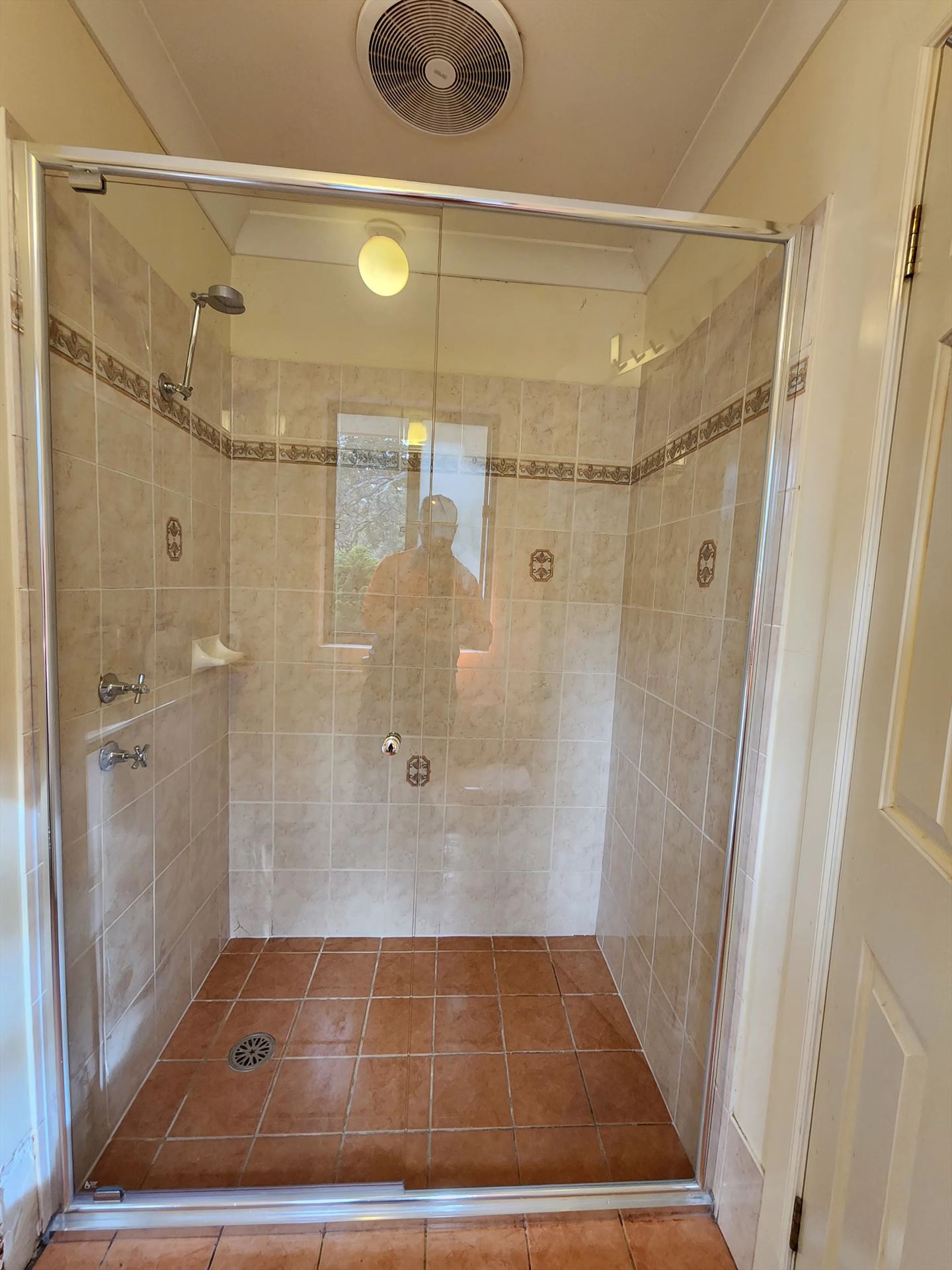 semi shower screen with chrome hardware installed in Castle Hill by Showerland
