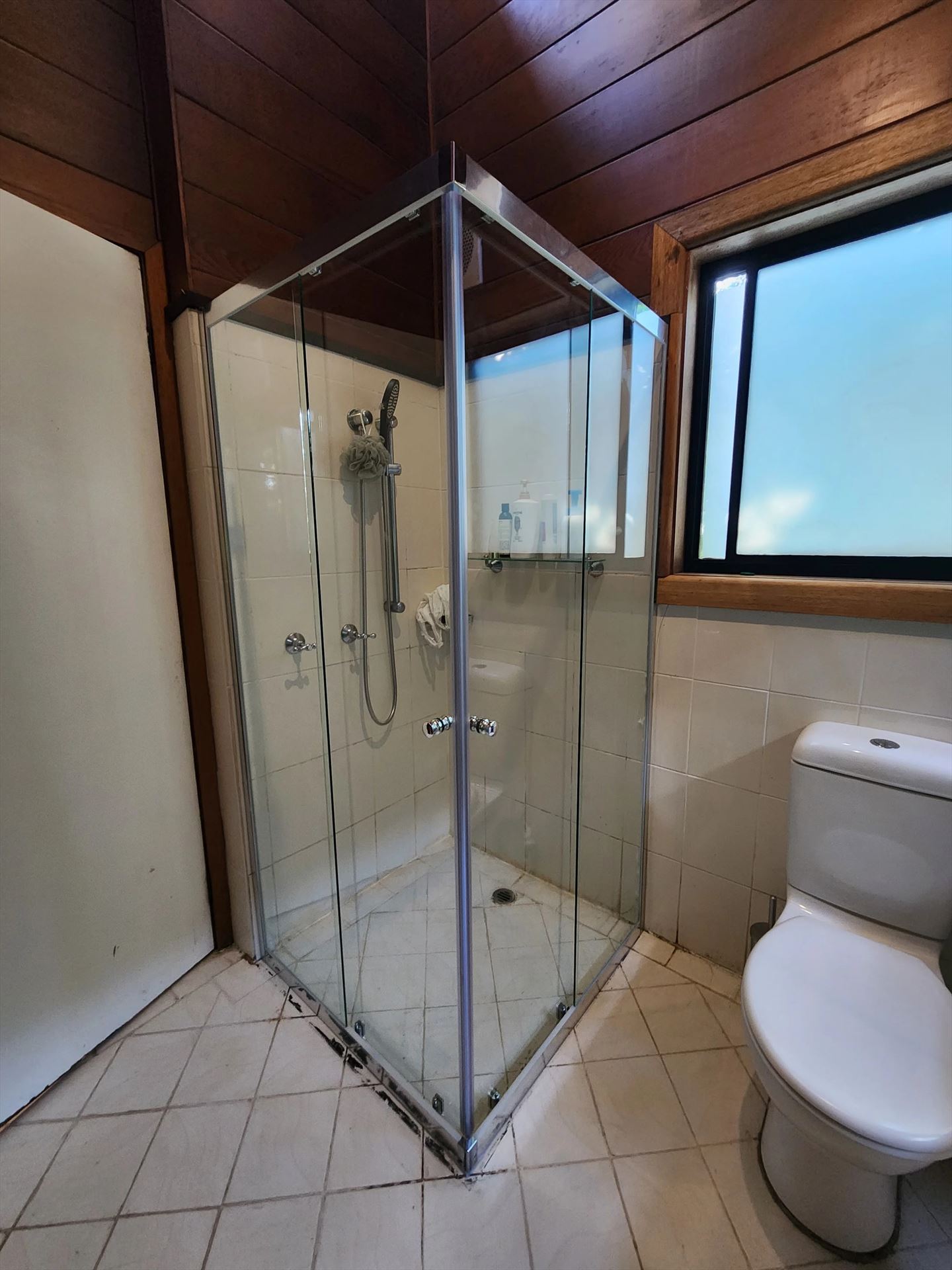 semi shower screen with chrome hardware installed in Hornsby Heights by Showerland