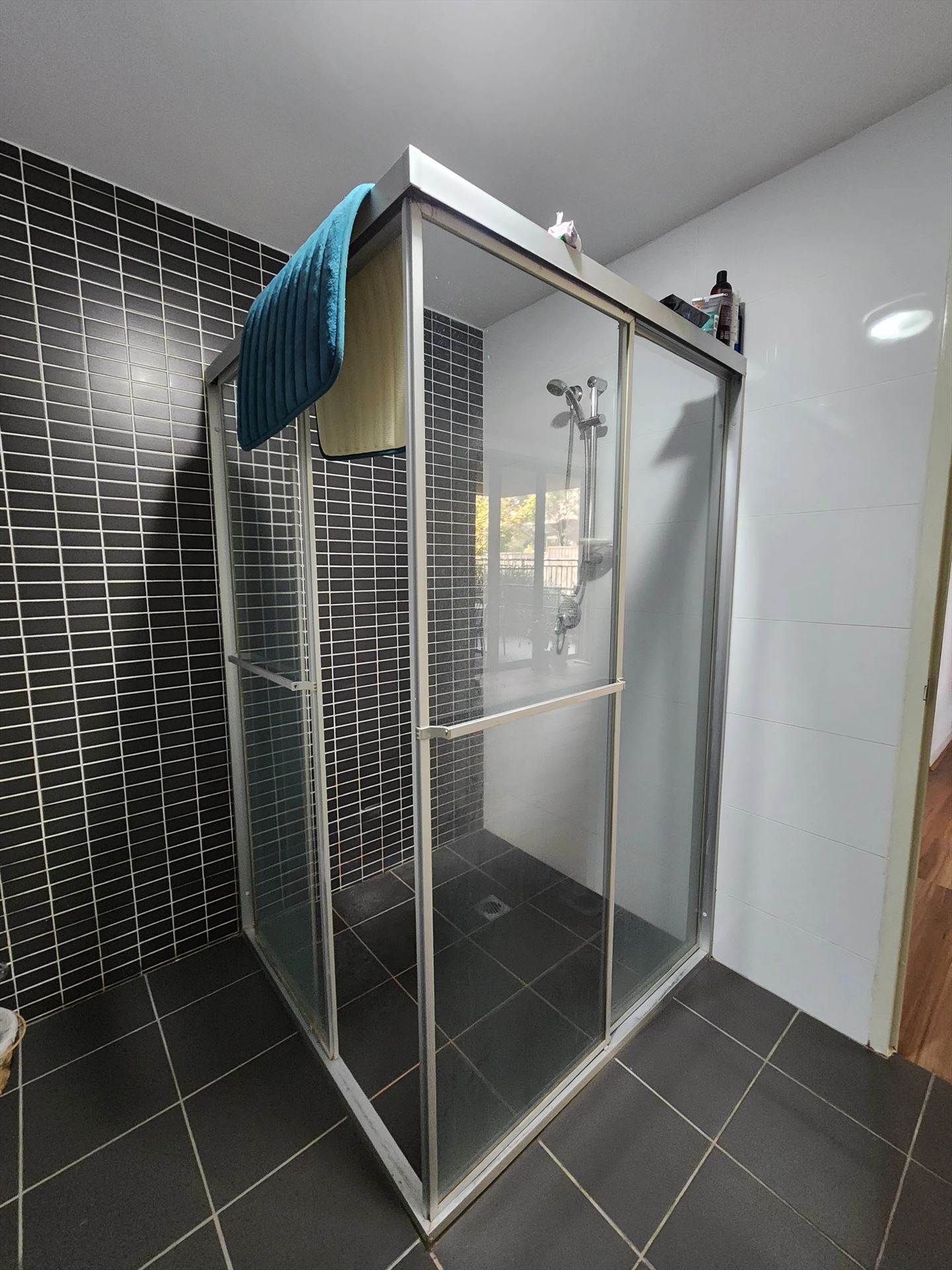 fully shower screen with chrome hardware installed in Westmead by Showerland