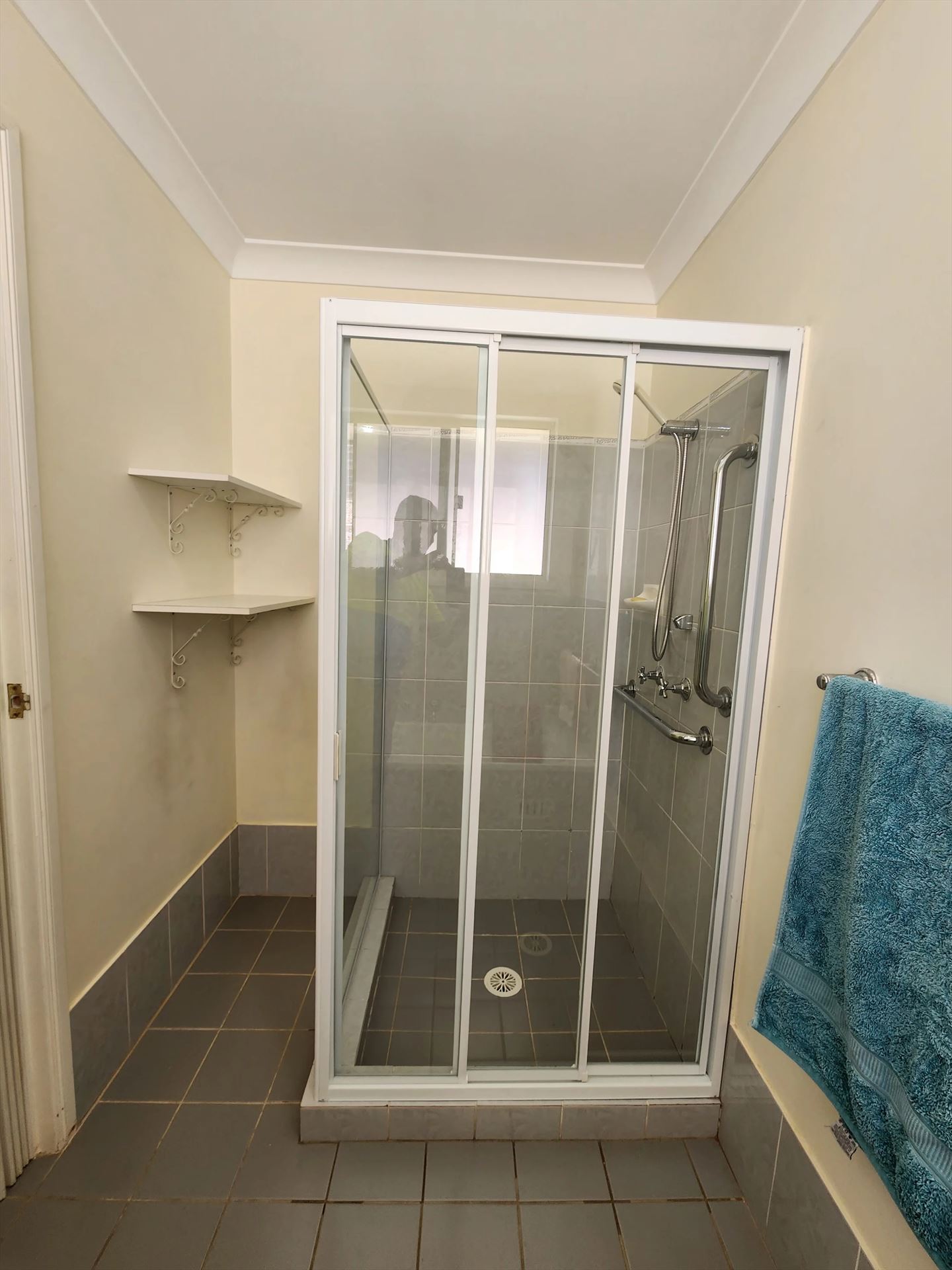 fully shower screen with white hardware installed in Quakers Hill by Showerland