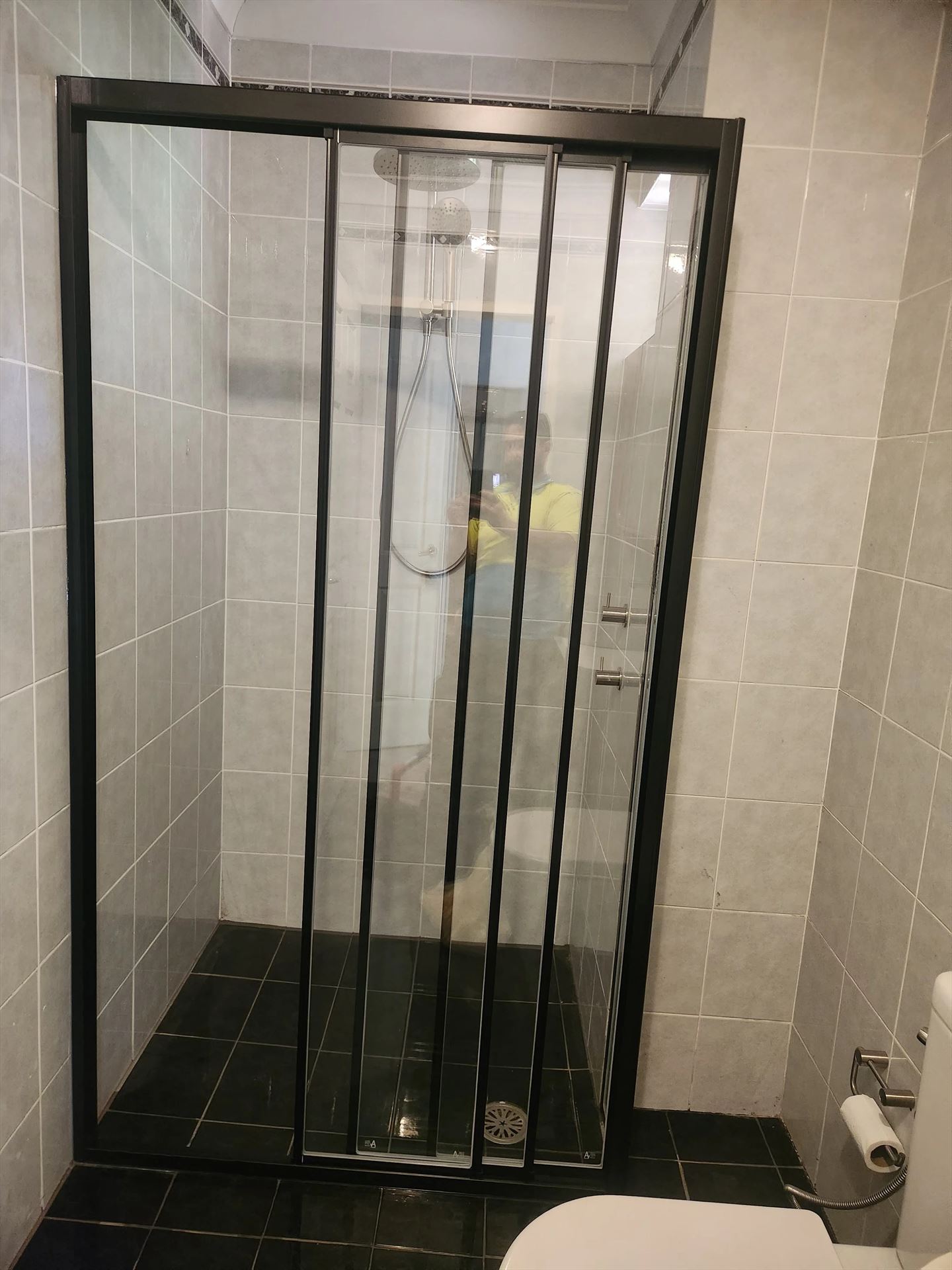 fully shower screen with black hardware installed in Artarmon by Showerland