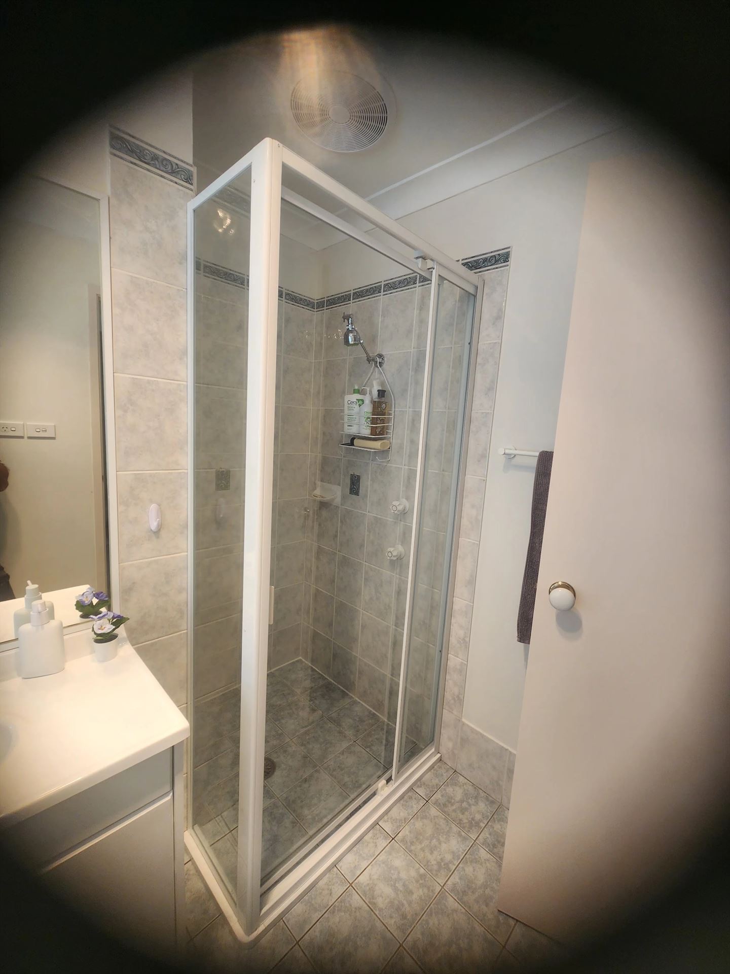 fully shower screen with white hardware installed in Doonside by Showerland