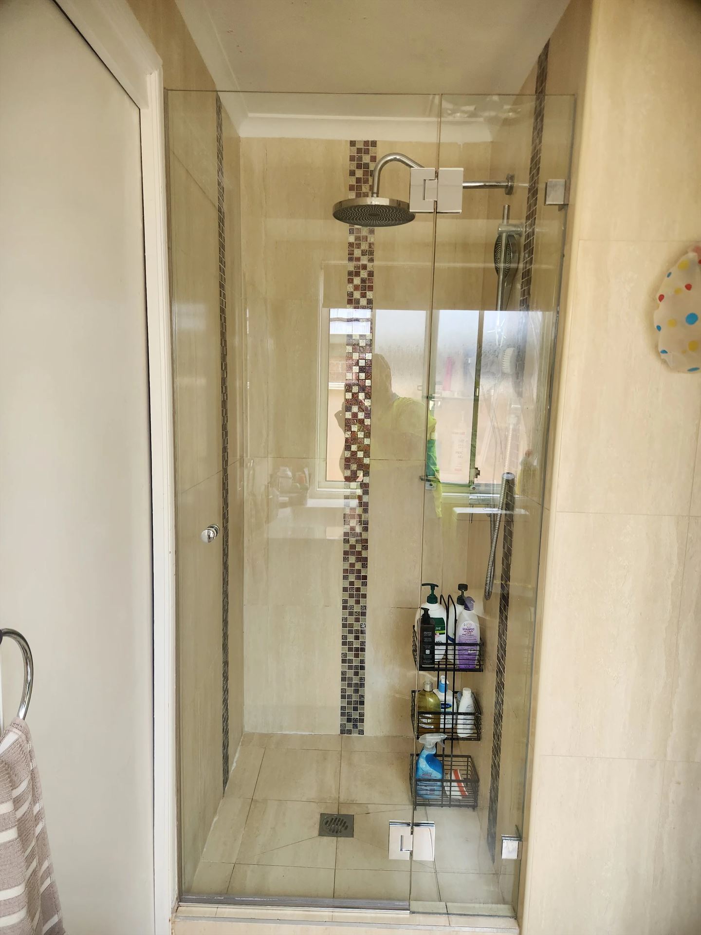 frameless shower screen with chrome hardware installed in Prospect by Showerland