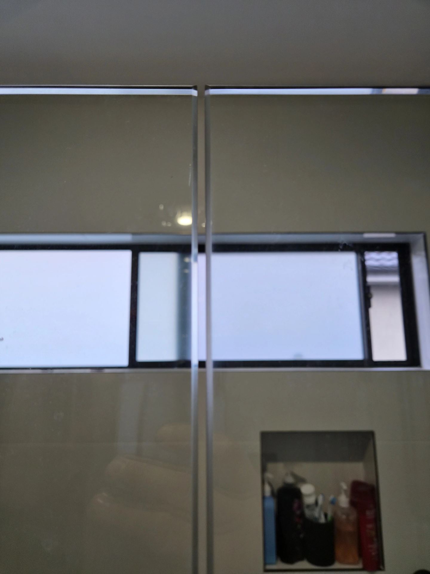 semi shower screen with chrome hardware installed in Punchbowl by Showerland