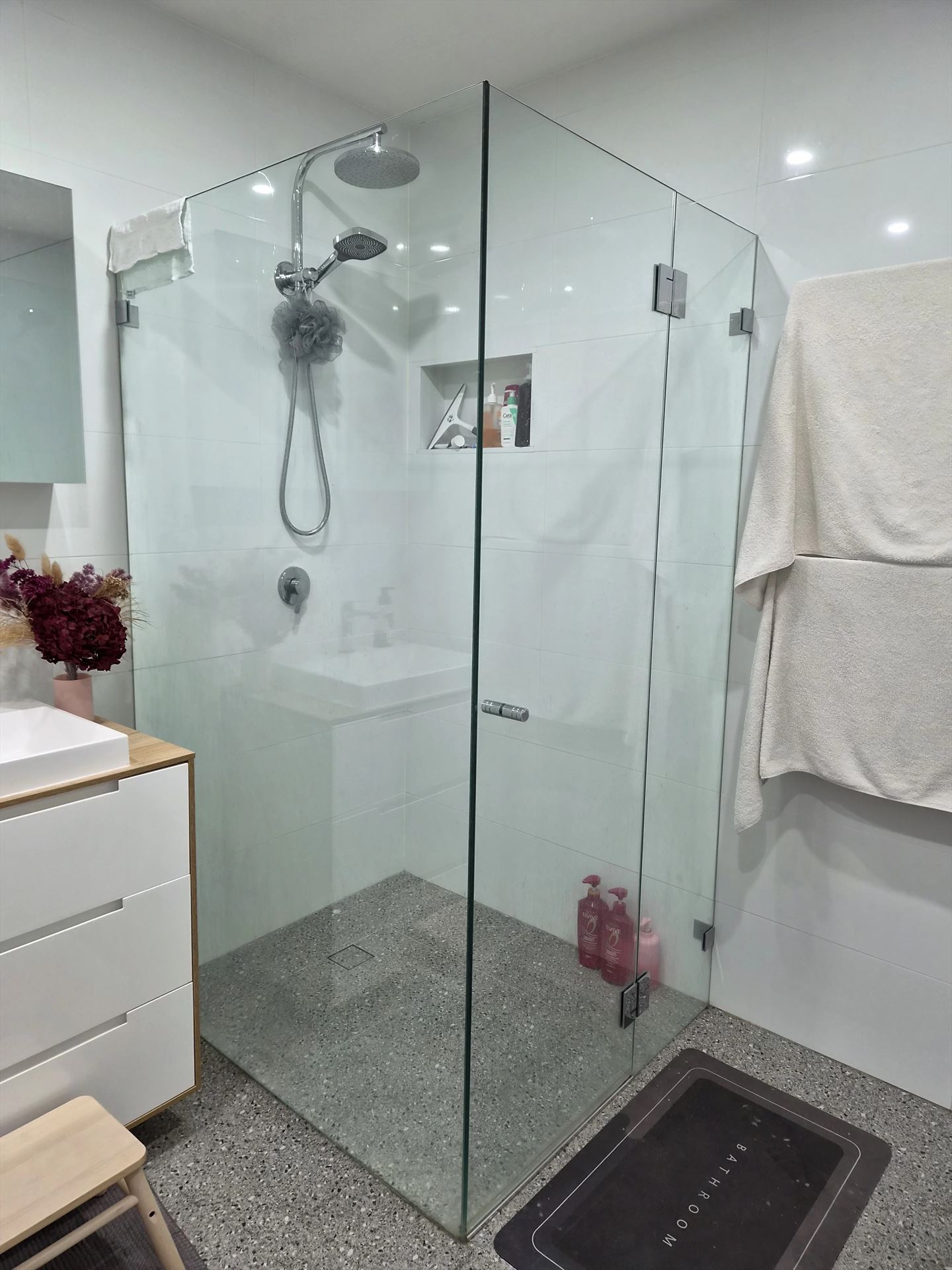frameless shower screen with chrome hardware installed in Punchbowl by Showerland