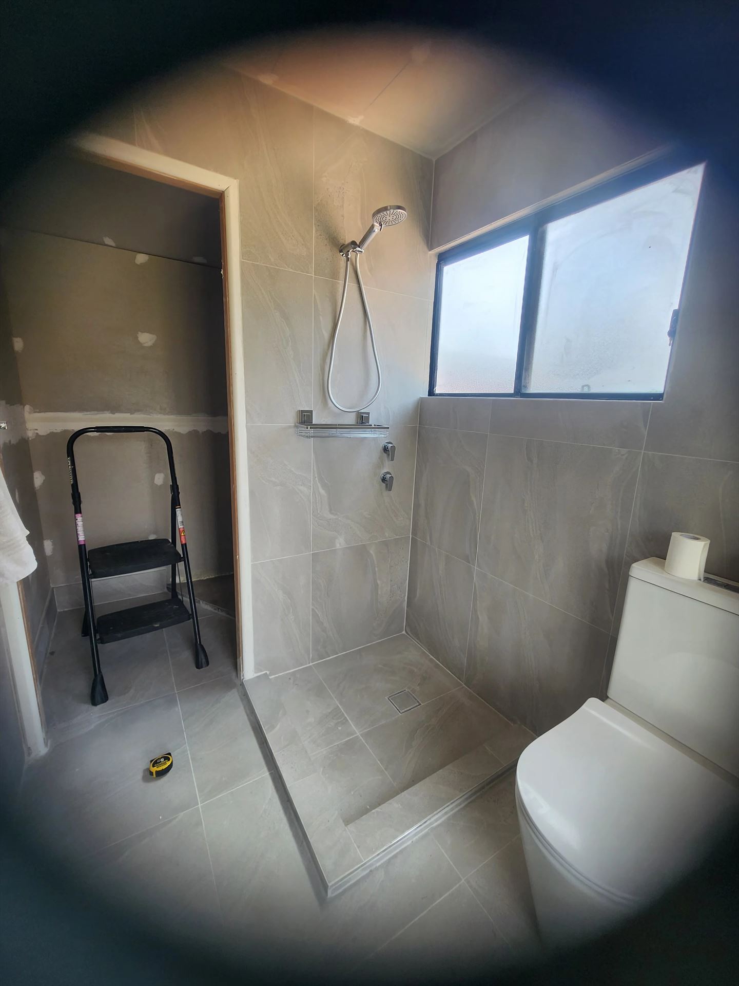 Bathroom before frameless shower screen install in Colyton