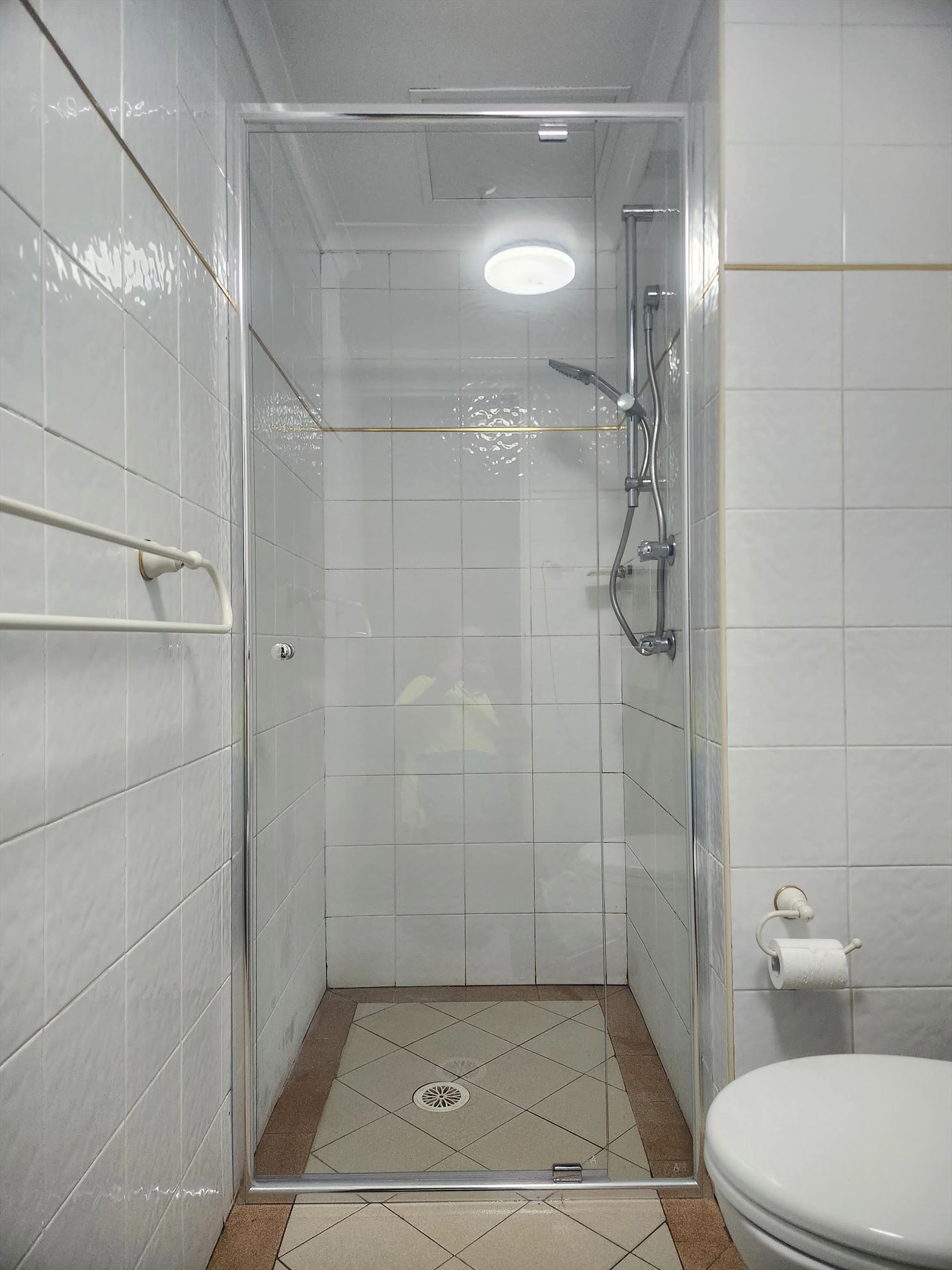semi shower screen with chrome hardware installed in Parramatta by Showerland
