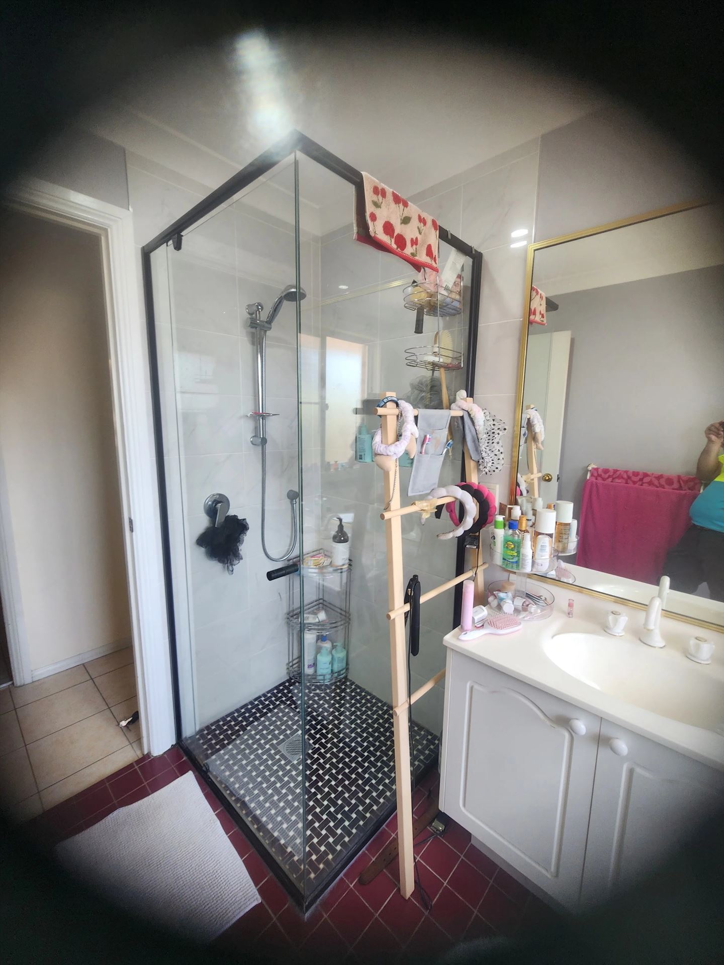 frameless shower screen with black hardware installed in Woodcroft by Showerland