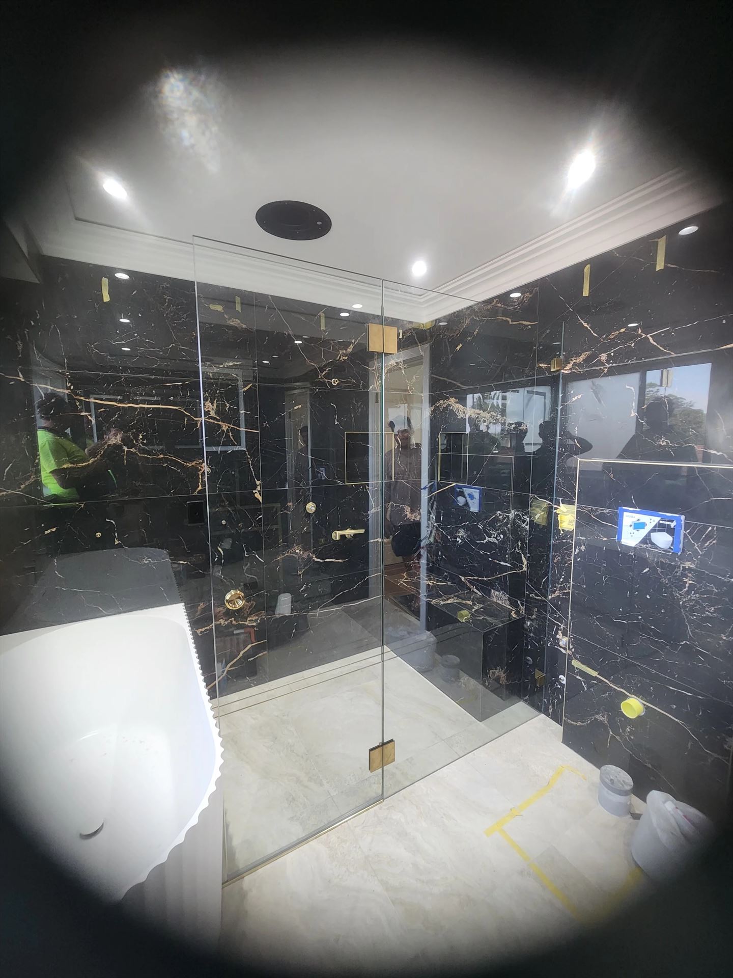 frameless shower screen with gold hardware installed in Guildford West by Showerland