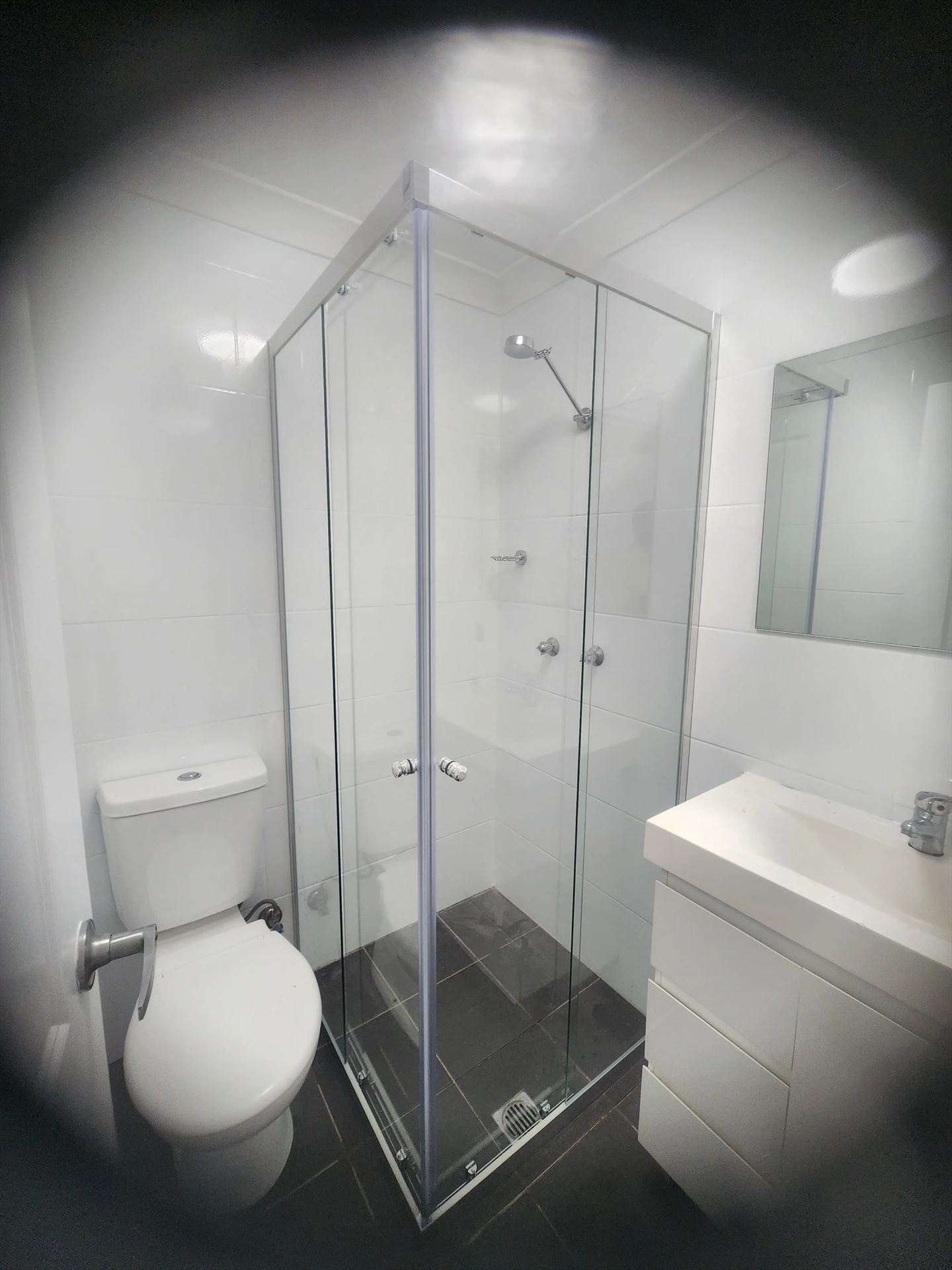 semi shower screen with chrome hardware installed in Parramatta by Showerland