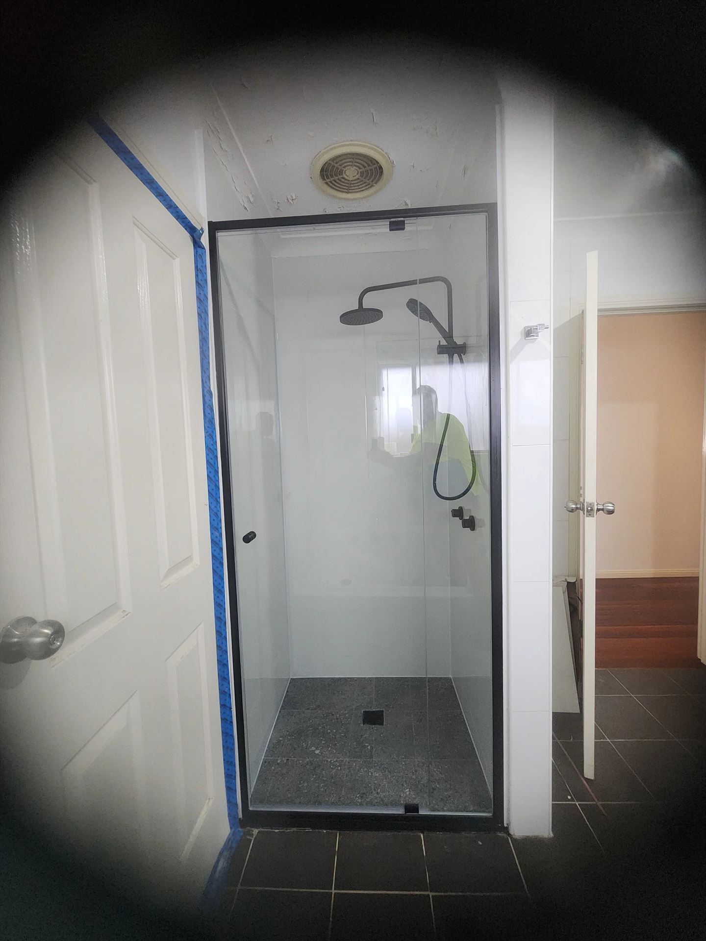 semi shower screen with black hardware installed in Greystanes by Showerland