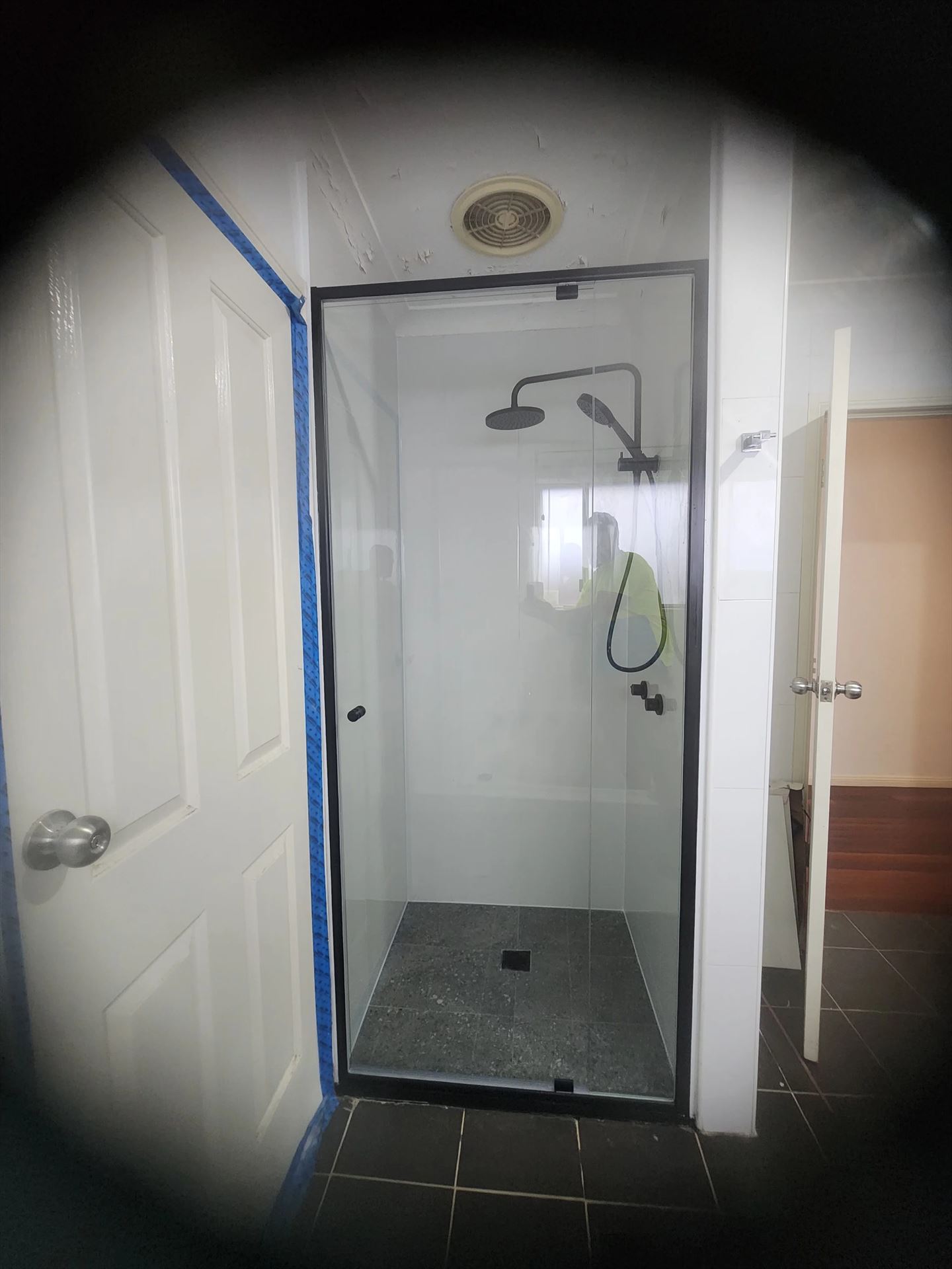 semi shower screen with black hardware installed in Greystanes by Showerland
