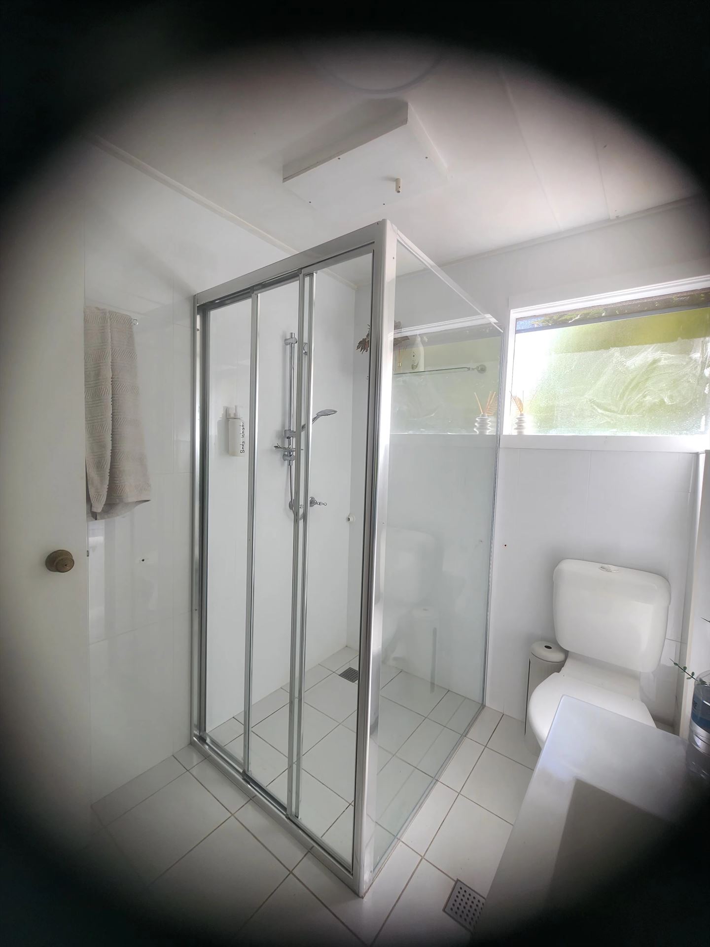 fully shower screen with chrome hardware installed in St Marys by Showerland