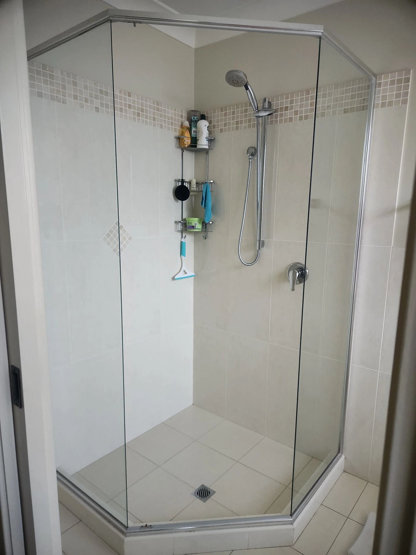 semi shower screen with chrome hardware installed in Quakers Hill by Showerland