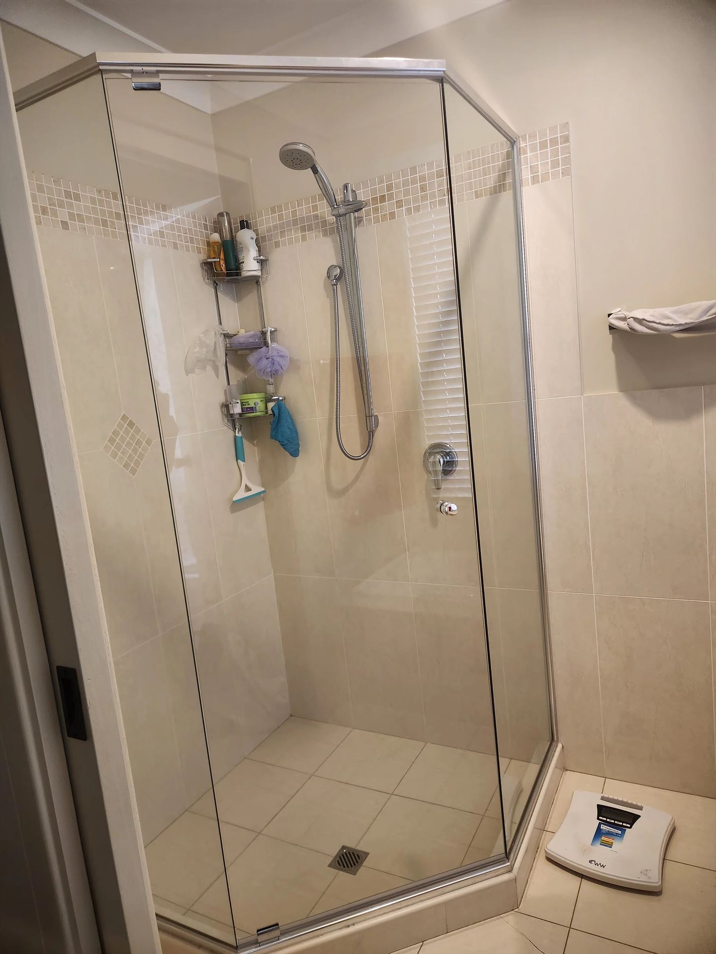 semi shower screen with chrome hardware installed in Quakers Hill by Showerland
