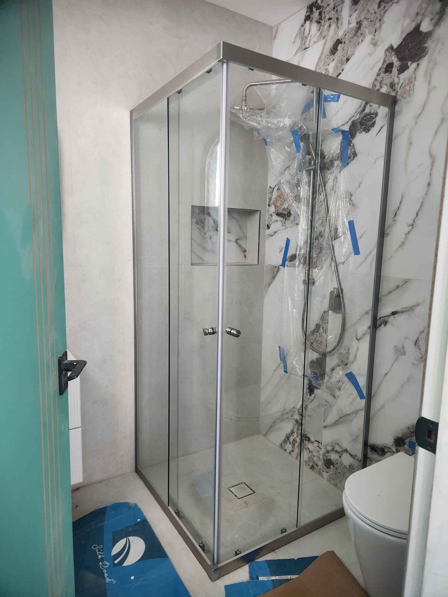 semi shower screen with chrome hardware installed in Carlingford by Showerland