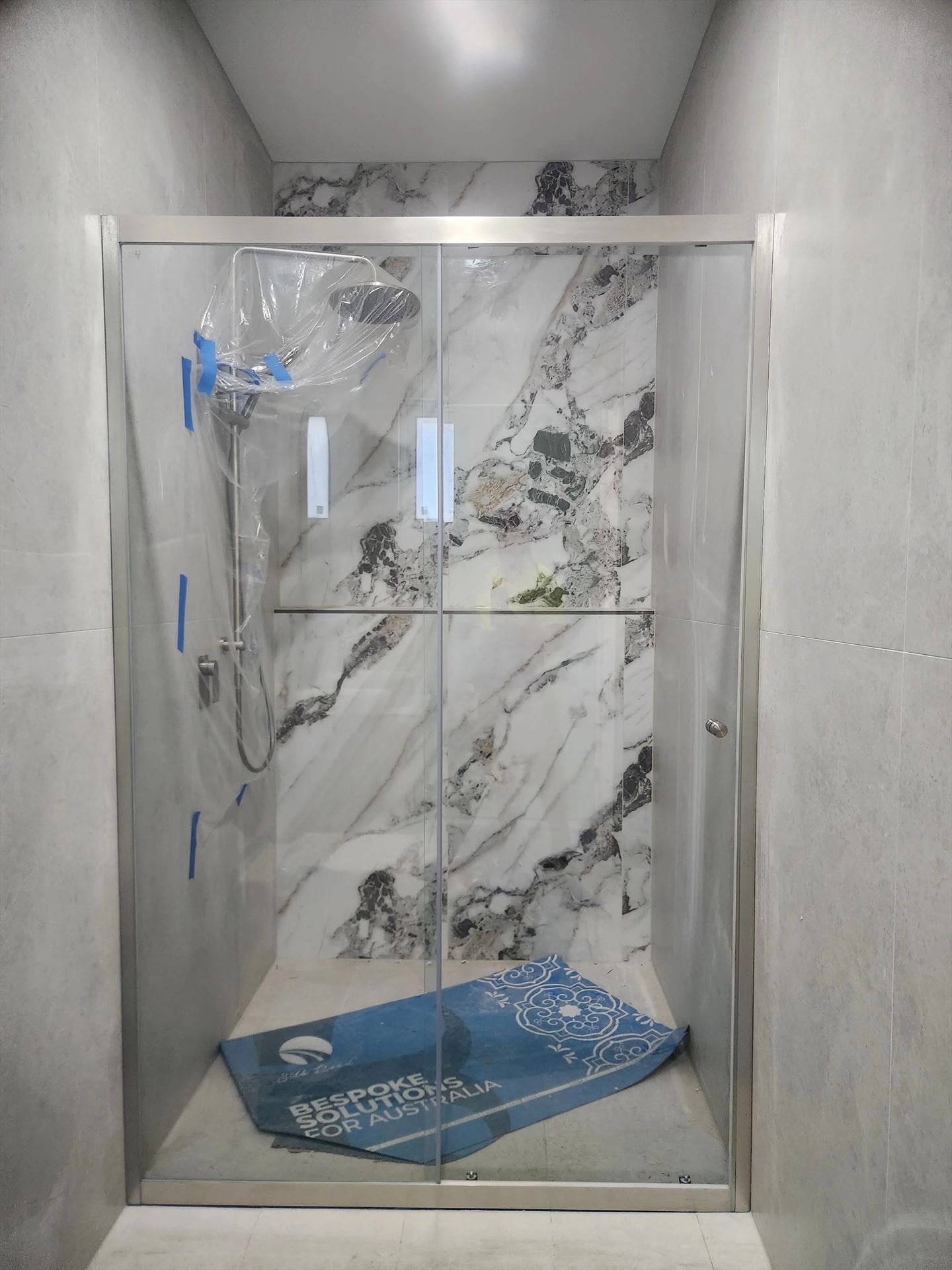 semi shower screen with chrome hardware installed in Carlingford by Showerland