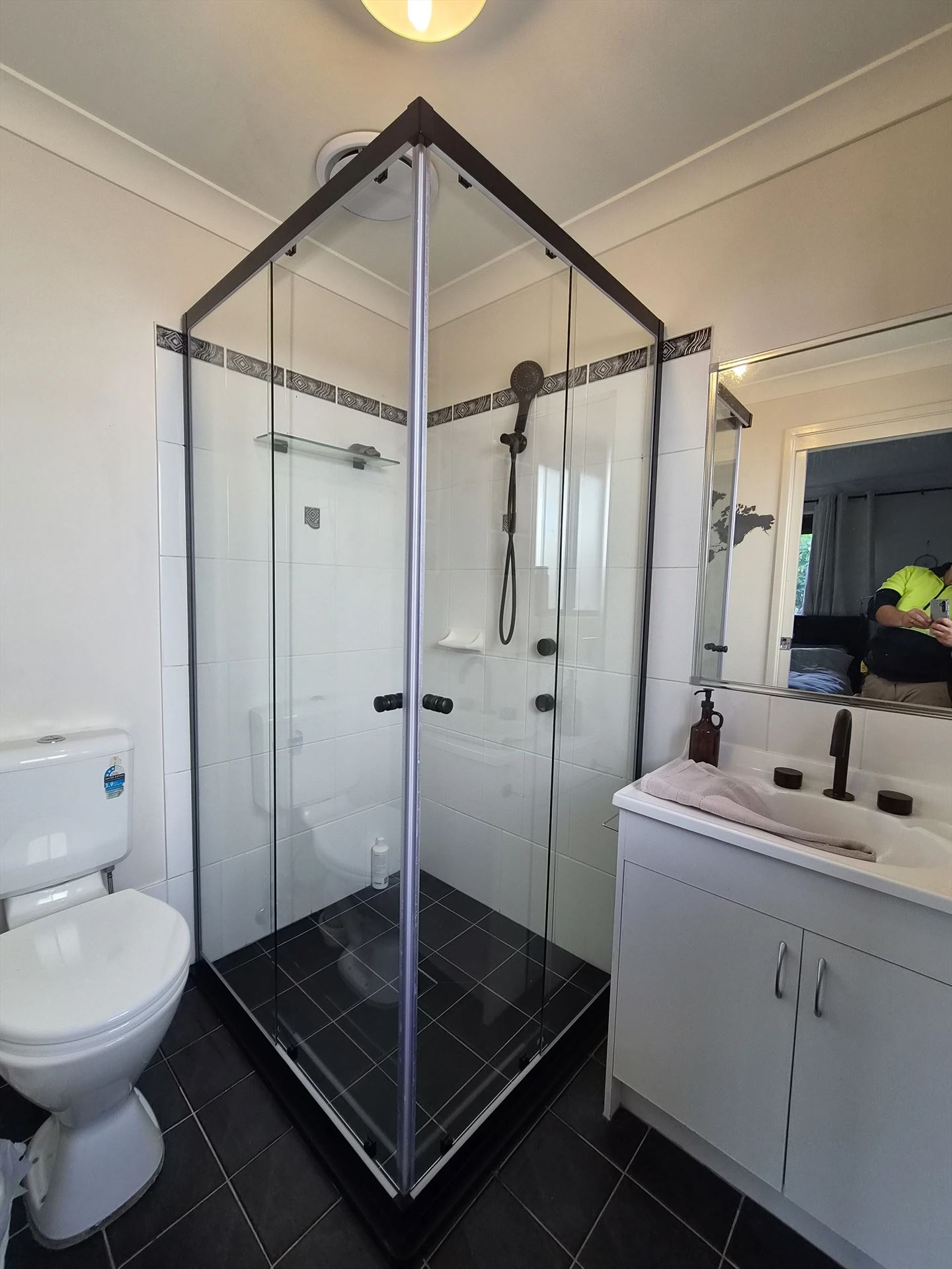 semi shower screen with black hardware installed in Parklea by Showerland