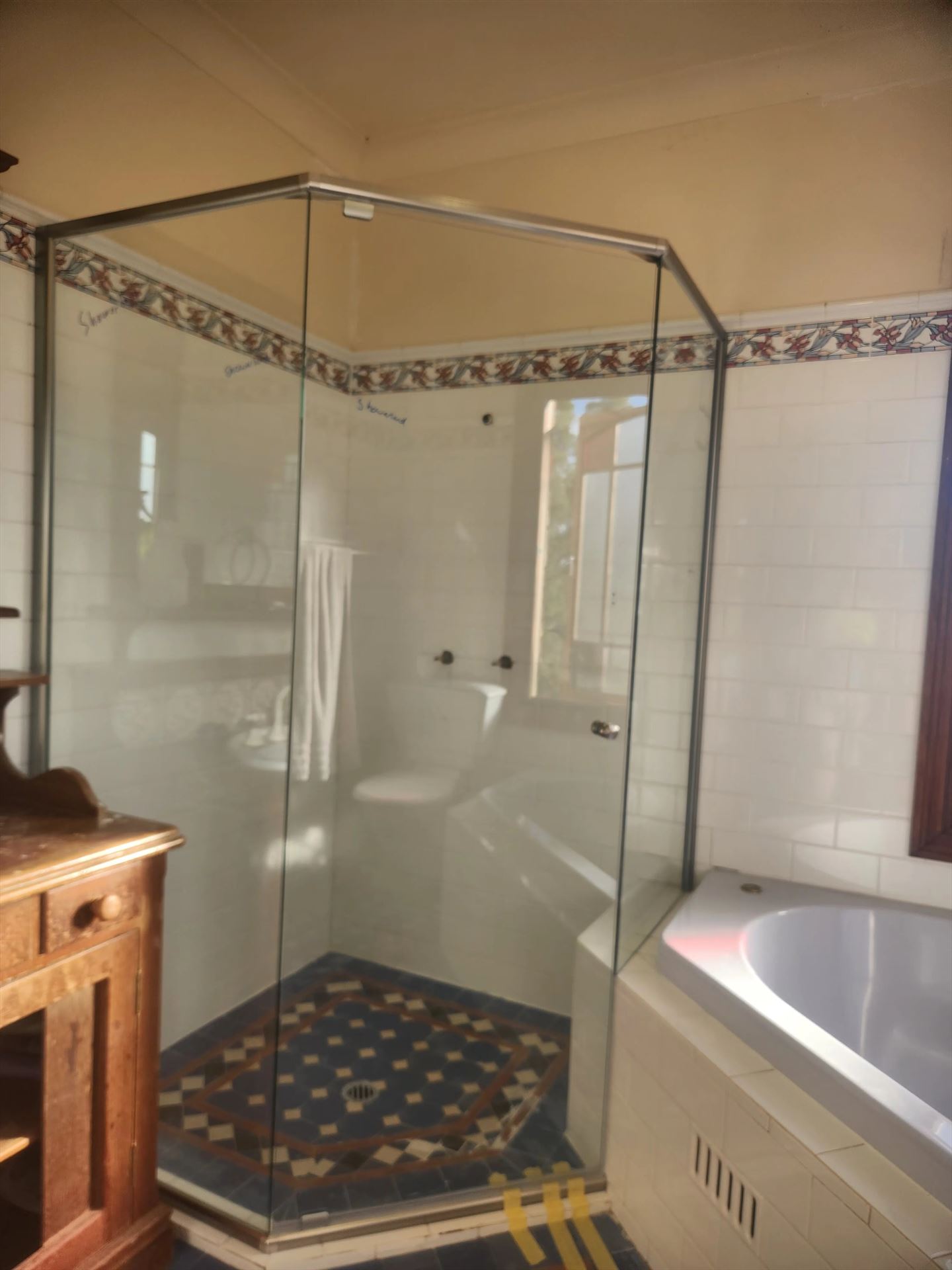 semi shower screen with chrome hardware installed in Kenthurst by Showerland