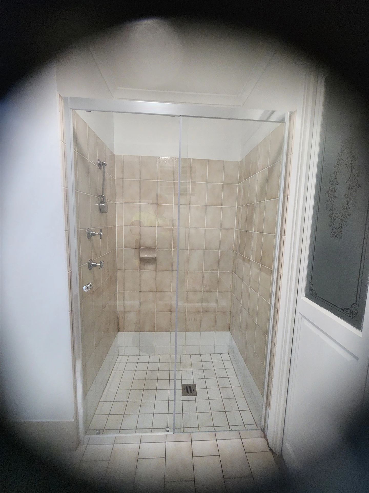 semi shower screen with chrome hardware installed in Minchinbury by Showerland