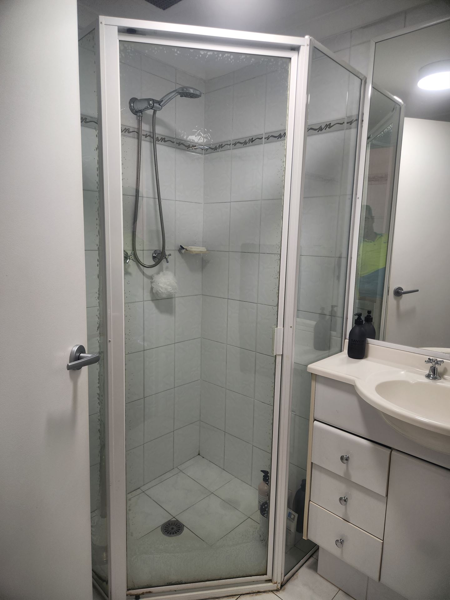 fully shower screen with white hardware installed in Wollstonecraft by Showerland