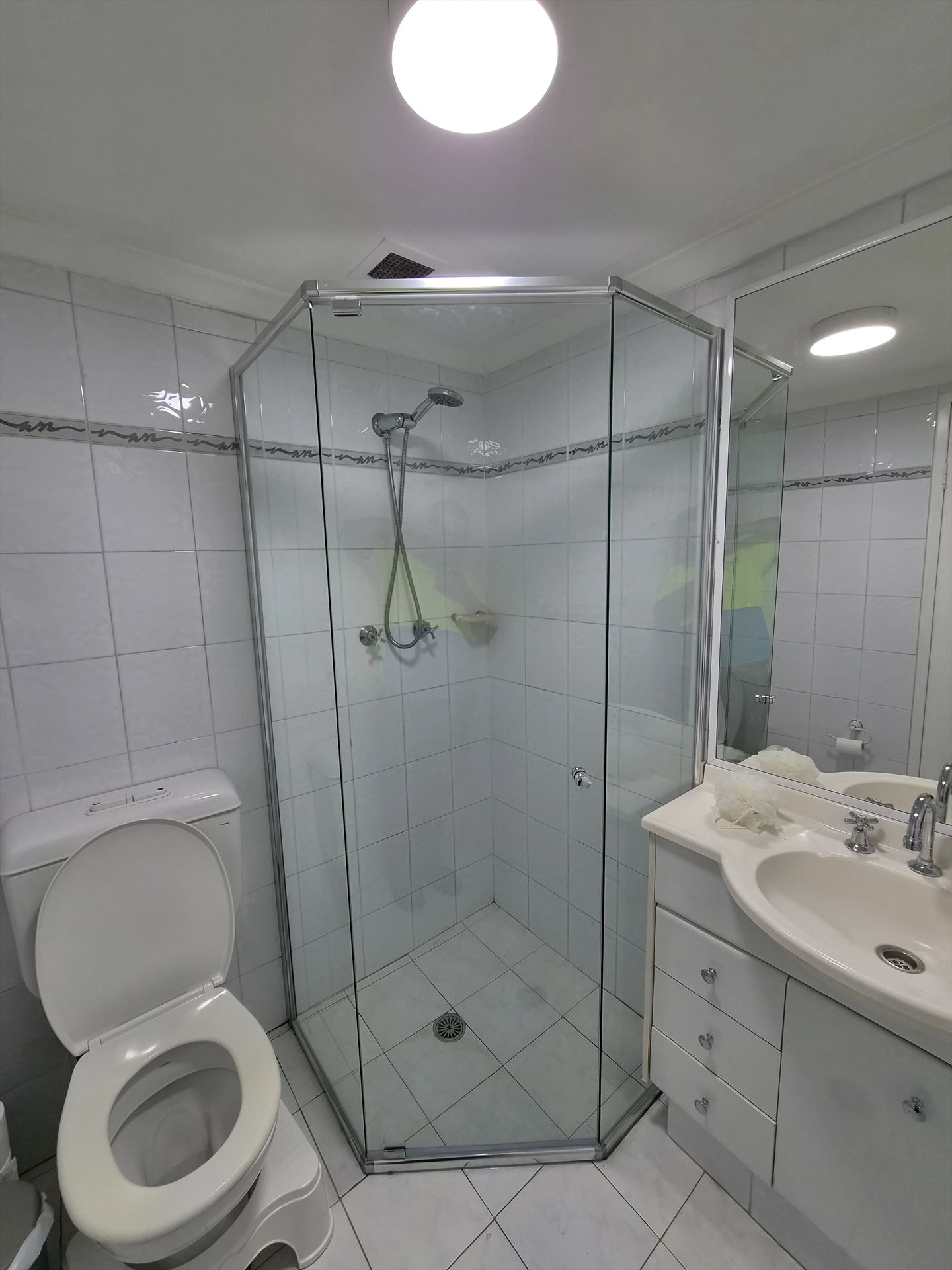 semi shower screen with chrome hardware installed in Wollstonecraft by Showerland