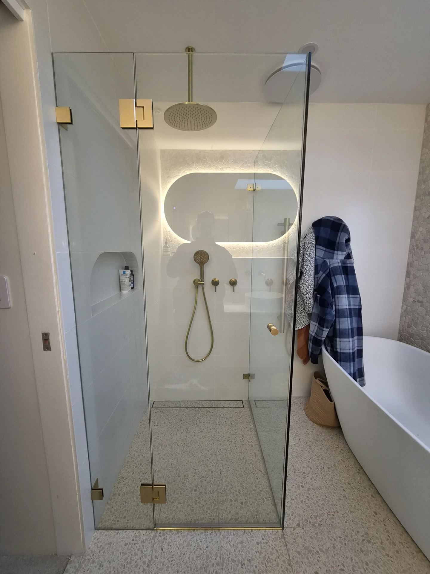 frameless shower screen with gold hardware installed in Beacon Hill by Showerland