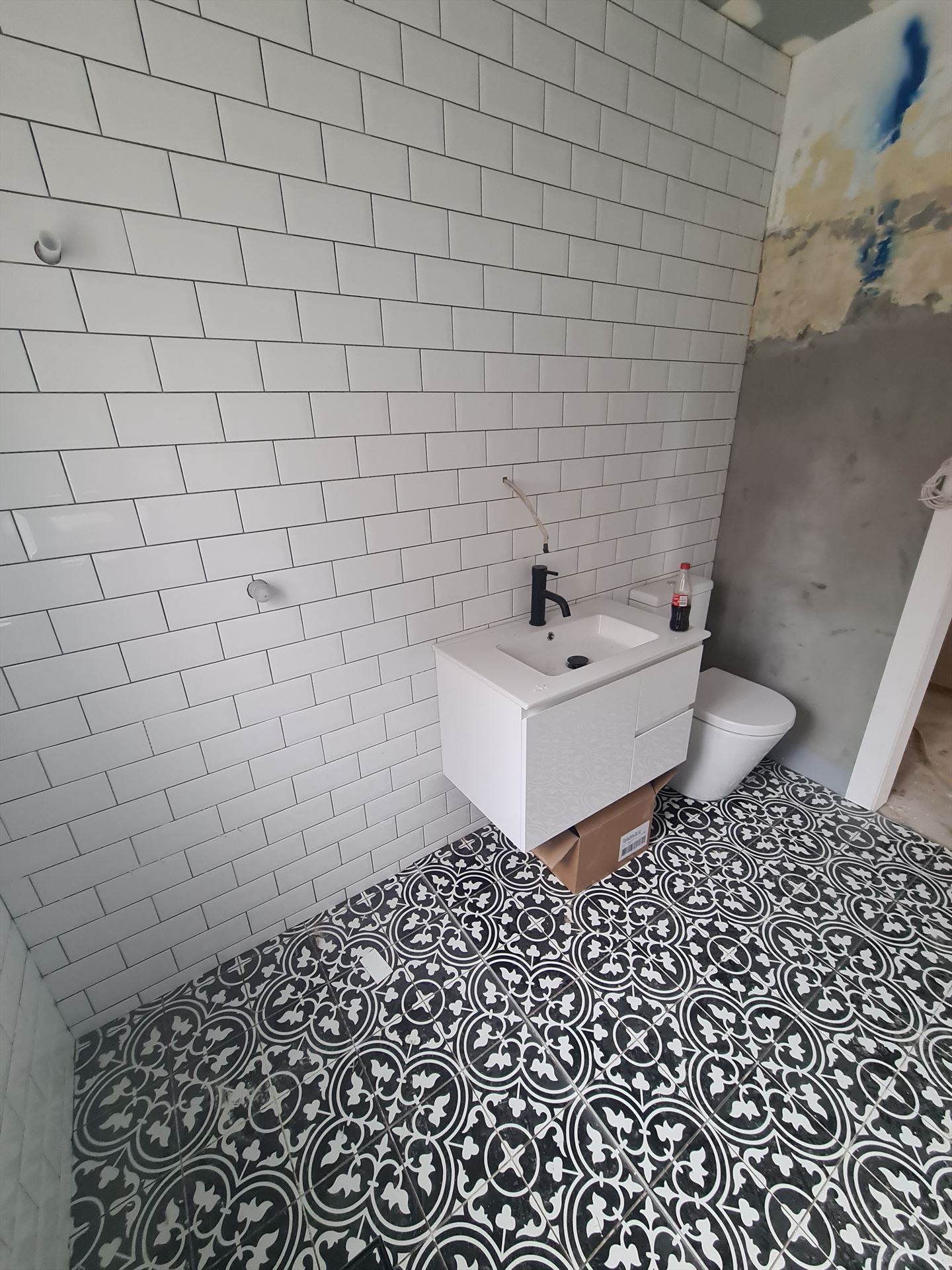 Bathroom before frameless shower screen install in Matraville