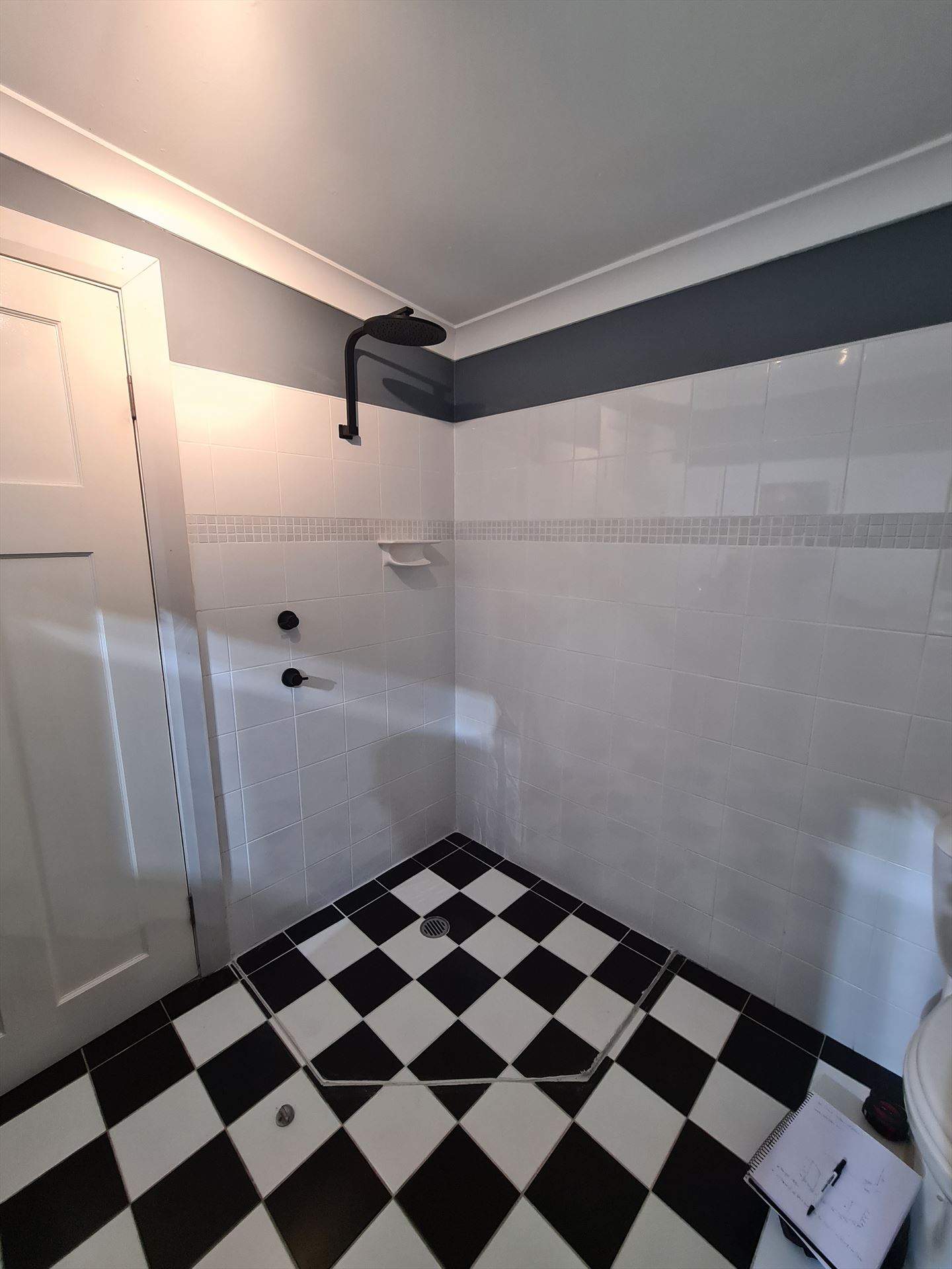 Bathroom before frameless shower screen install in Springwood