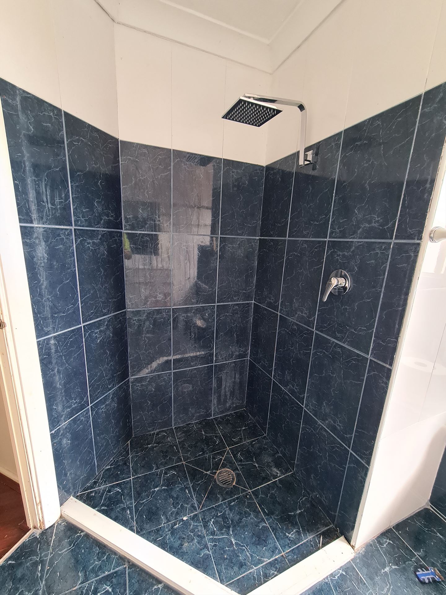 Bathroom before frameless shower screen install in Glenwood