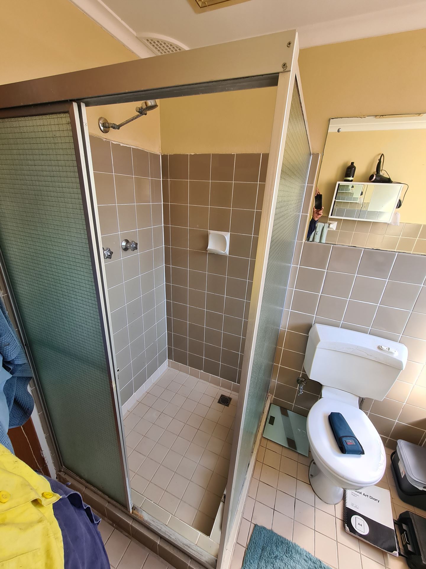 Bathroom before frameless shower screen install in Marrickville