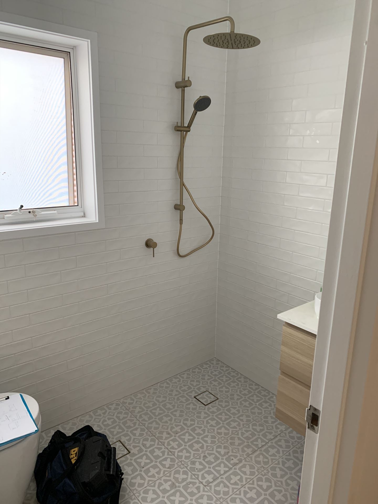 Bathroom before frameless shower screen install in Bundeena