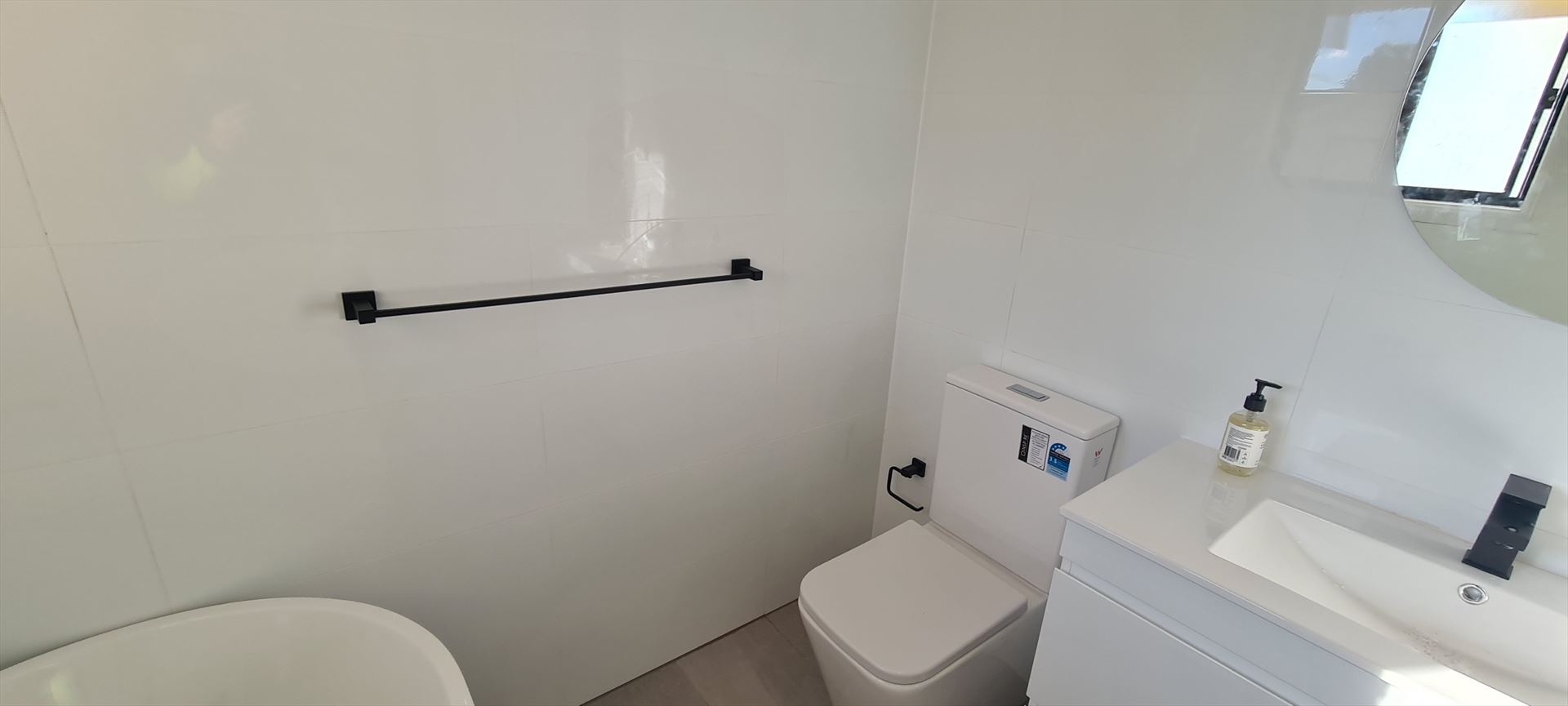 Bathroom before frameless shower screen install in Castle Hill