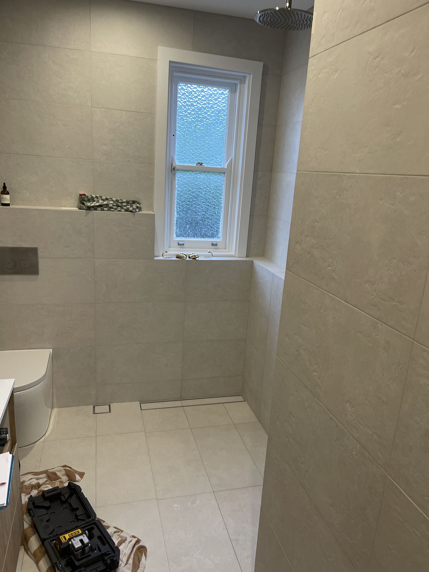 Bathroom before frameless shower screen install in Coogee