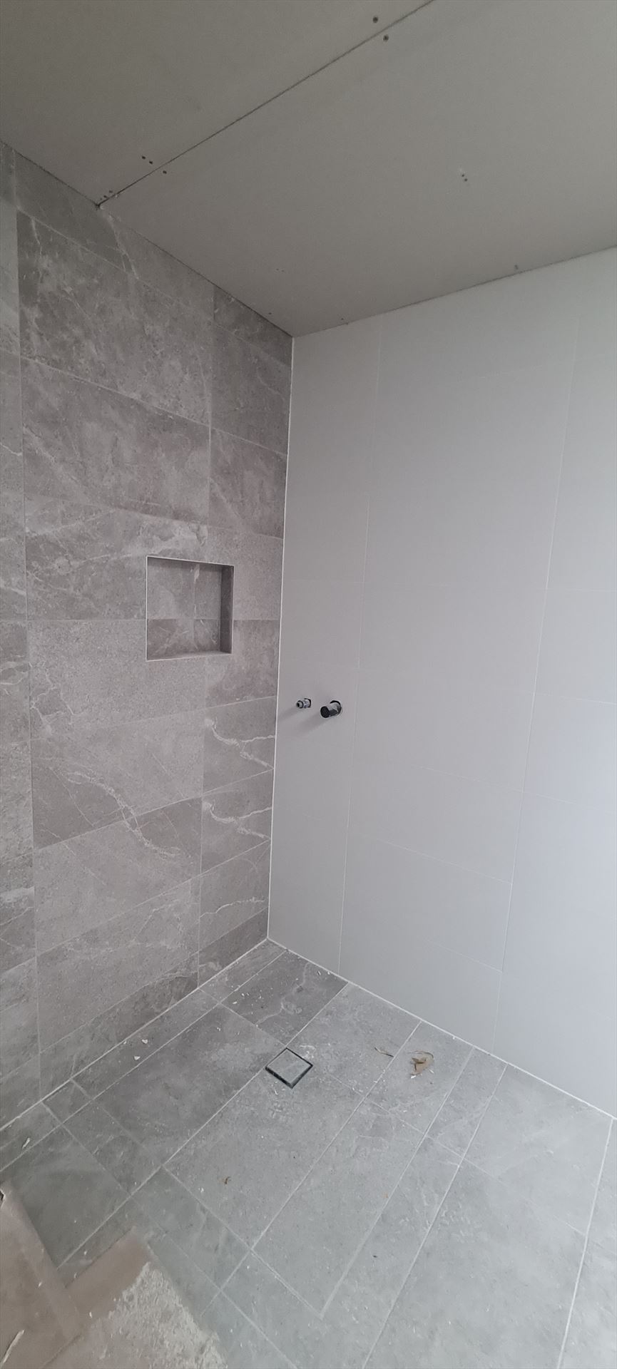 Bathroom before frameless shower screen install in Bangor