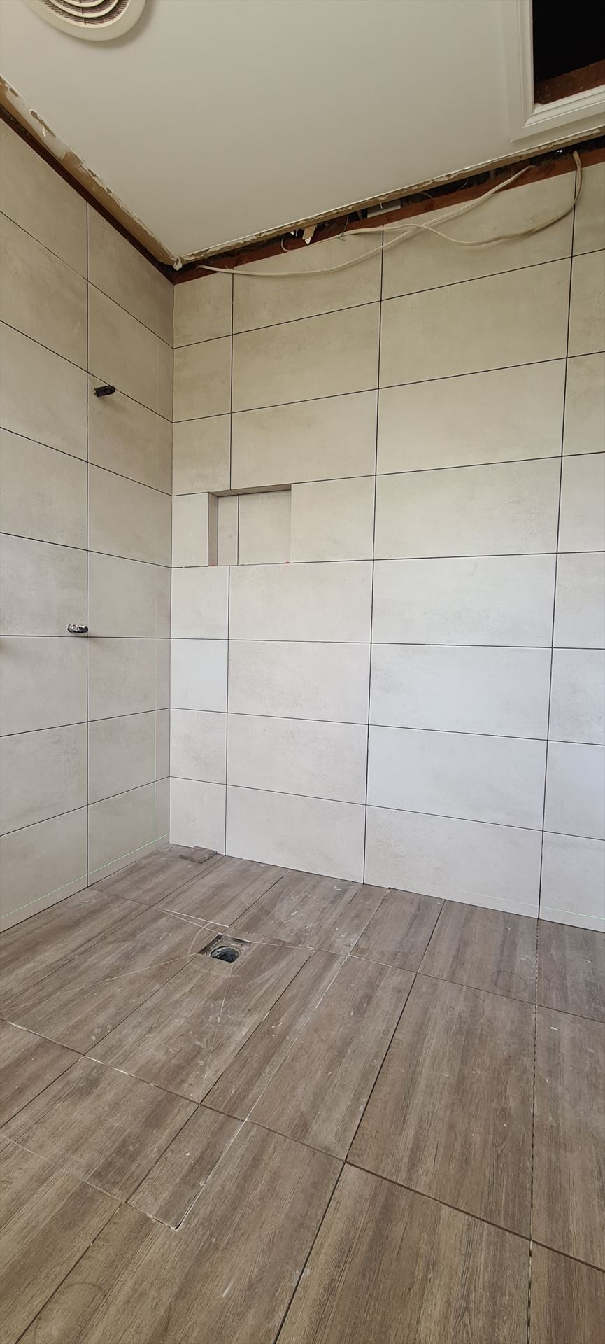 Bathroom before frameless shower screen install in Castle Hill