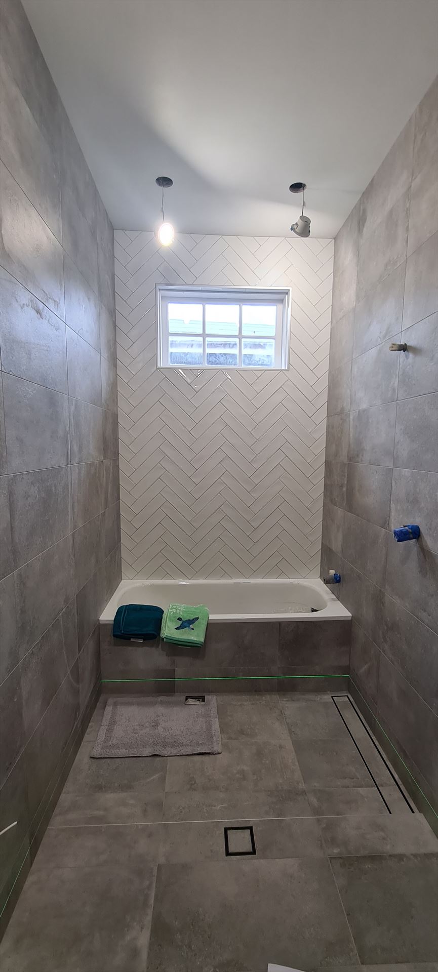 Bathroom before frameless shower screen install in Maroubra