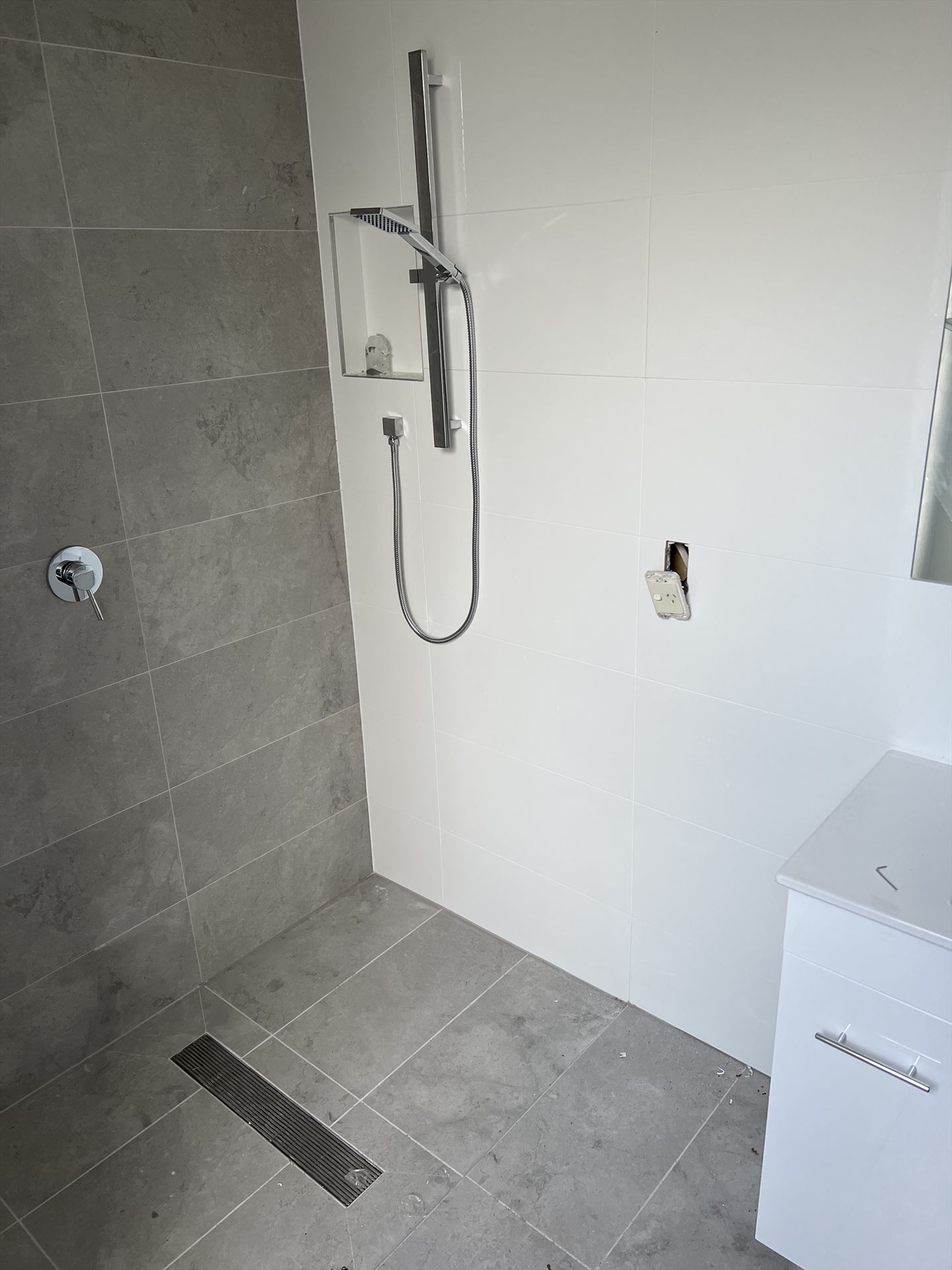 Bathroom before frameless shower screen install in Menai