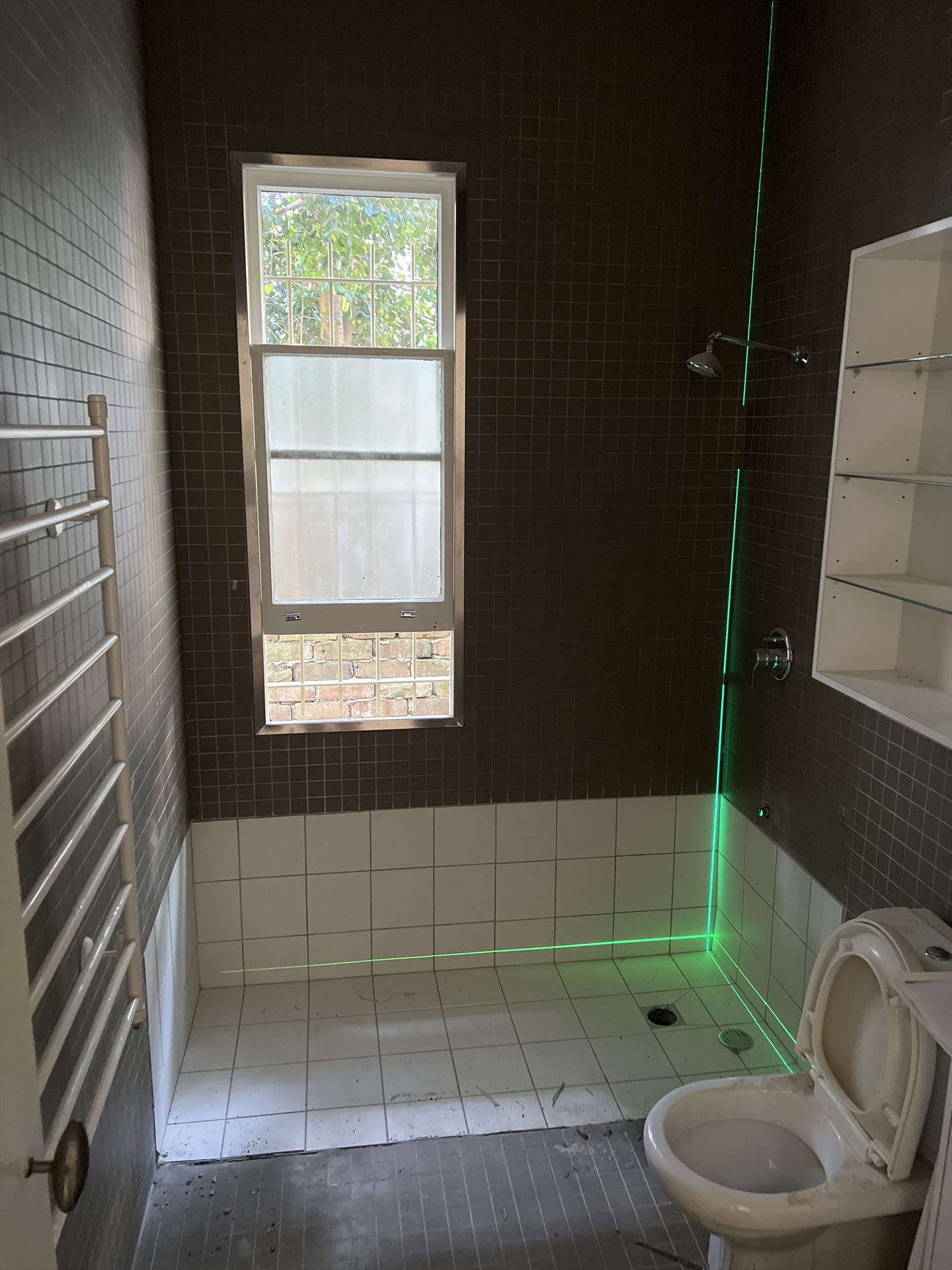 Bathroom before frameless shower screen install in Balmain