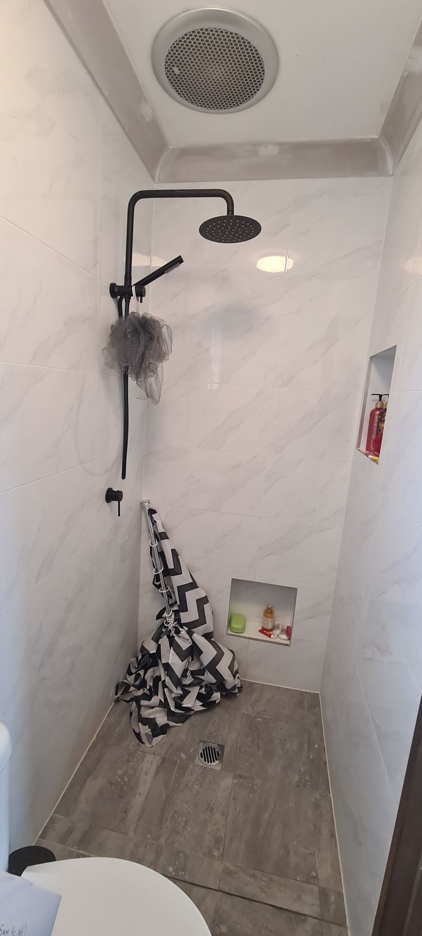 fully shower screen with black hardware installed in Berala by Showerland
