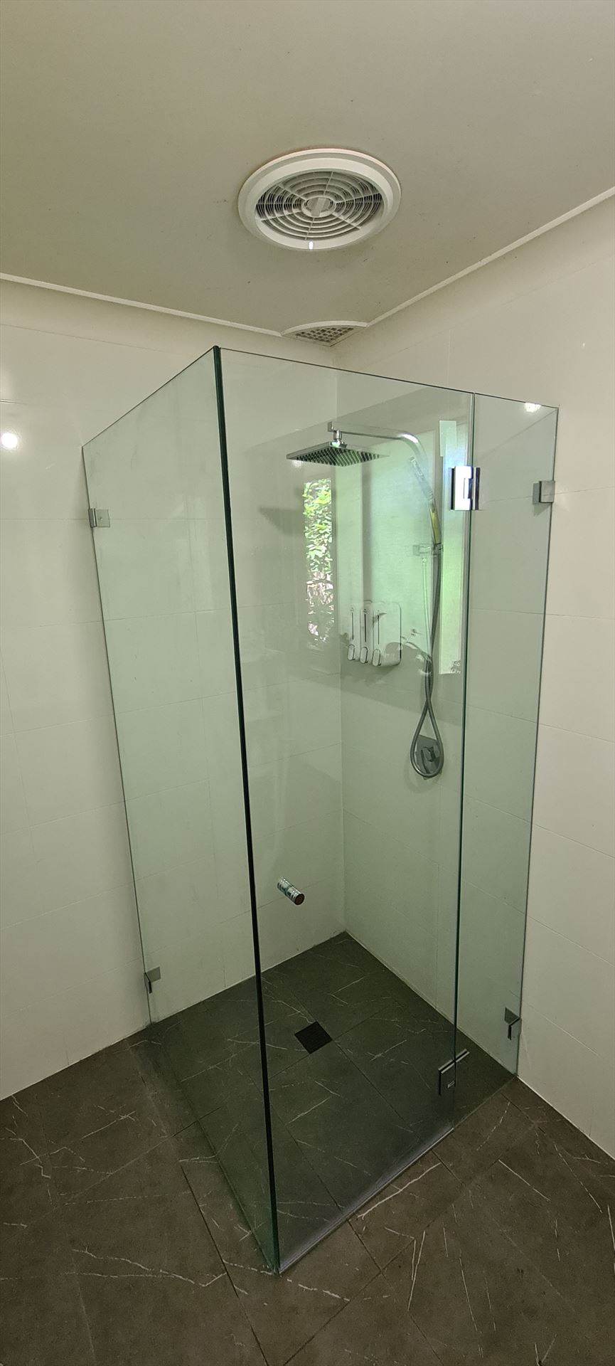 frameless shower screen with chrome hardware installed in St Clair by Showerland